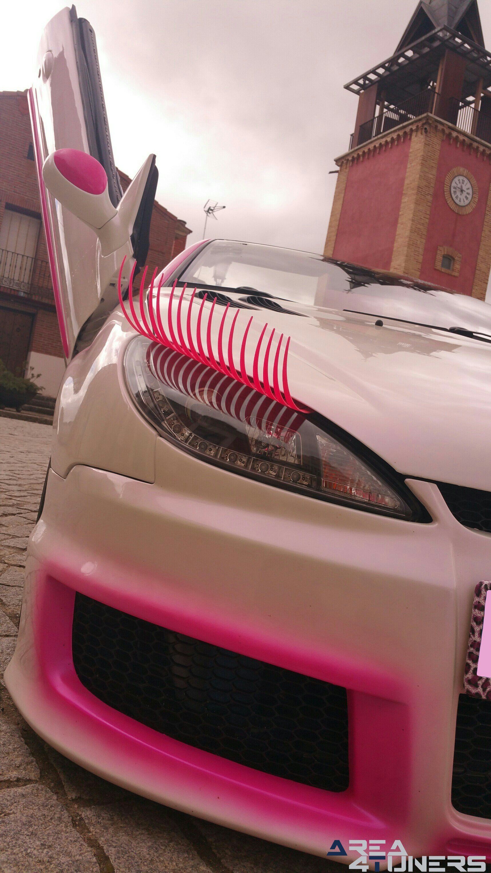 Imagen reportaje coche Tuning Peugeot 206 Mirada Femenina Imagen perteneciente al reportaje fotográfico de la revista Tuning de publicación diaria Area4tuners.es sobre un Peugeot 206