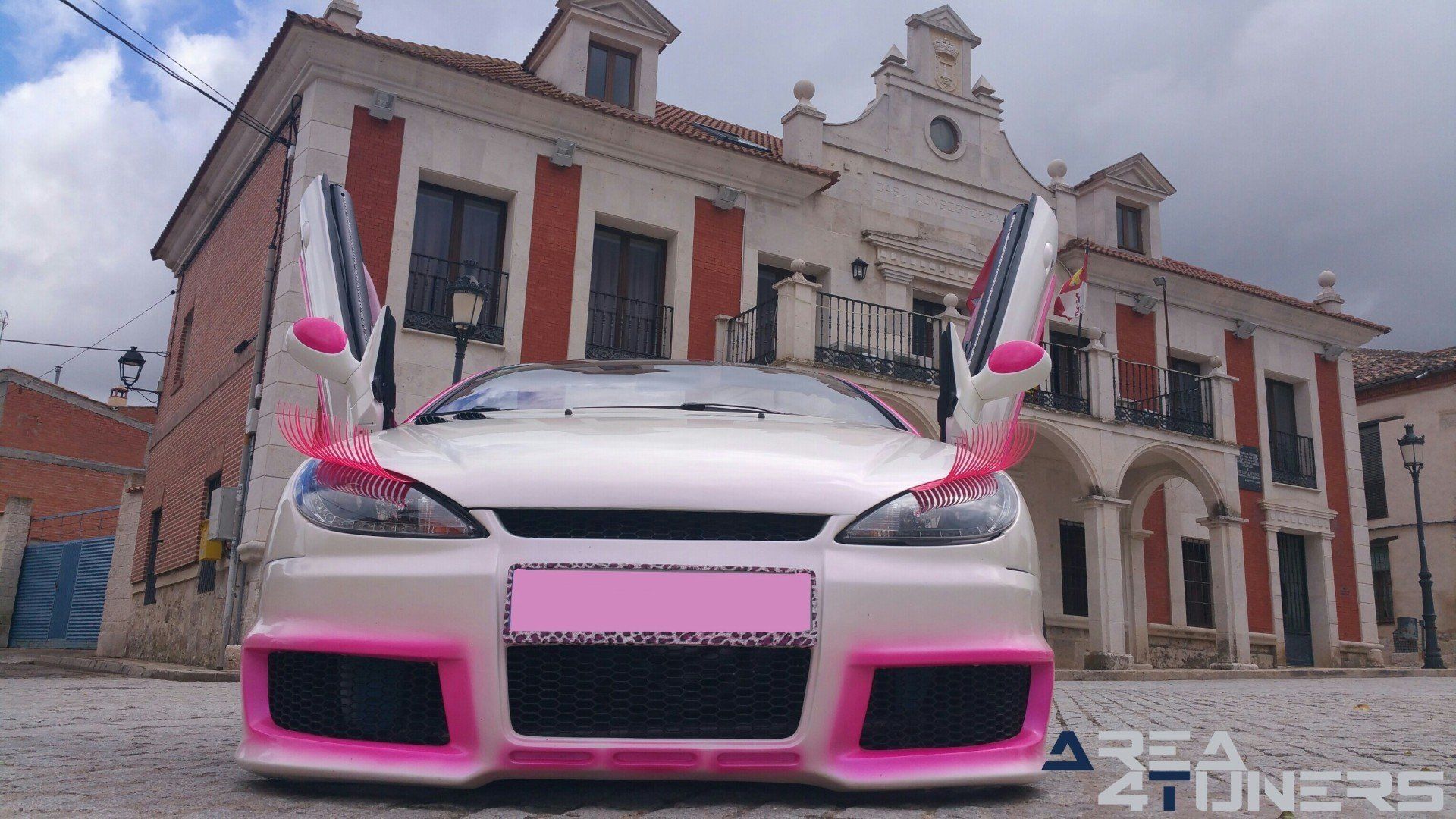 Imagen reportaje coche Tuning Peugeot 206 Mirada Femenina Imagen perteneciente al reportaje fotográfico de la revista Tuning de publicación diaria Area4tuners.es sobre un Peugeot 206