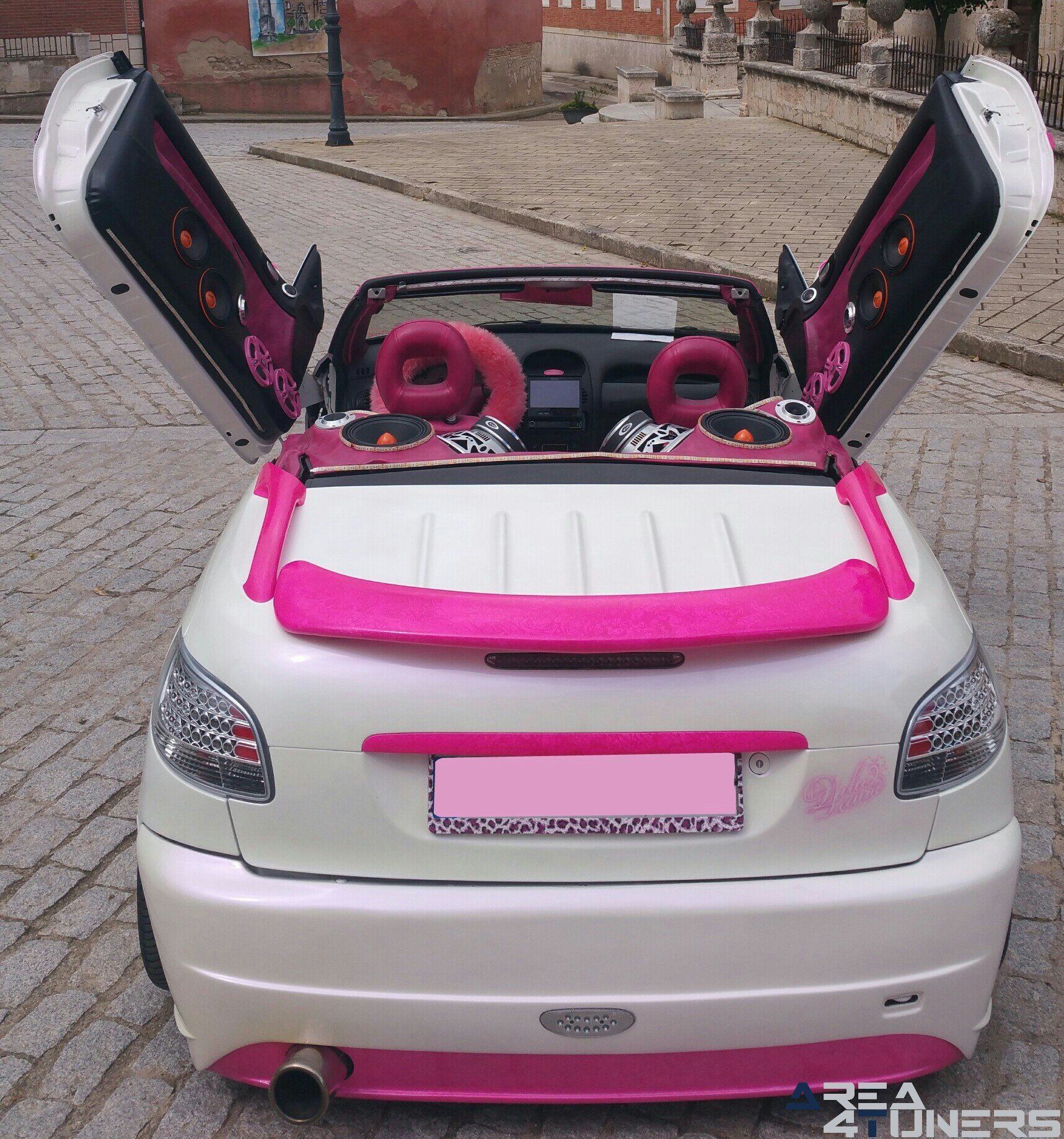 Imagen reportaje coche Tuning Peugeot 206 Mirada Femenina Imagen perteneciente al reportaje fotográfico de la revista Tuning de publicación diaria Area4tuners.es sobre un Peugeot 206