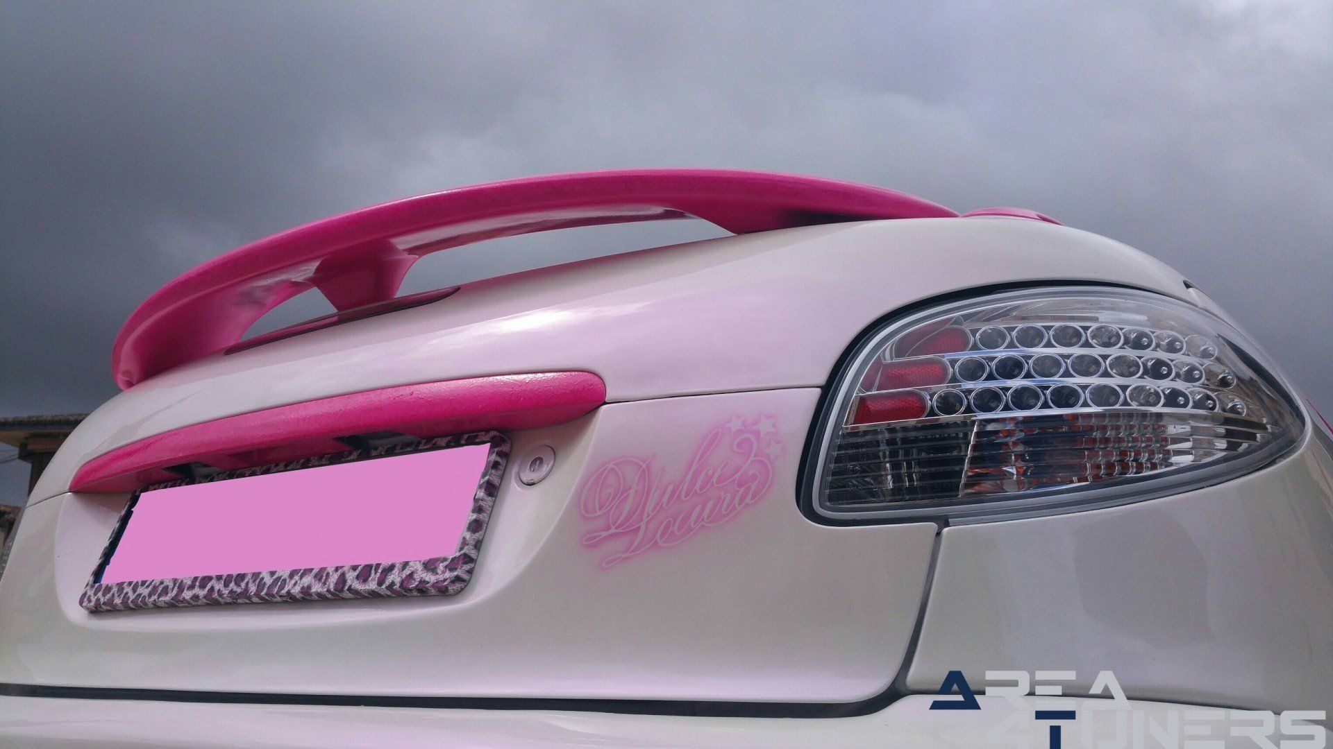 Imagen reportaje coche Tuning Peugeot 206 Mirada Femenina Imagen perteneciente al reportaje fotográfico de la revista Tuning de publicación diaria Area4tuners.es sobre un Peugeot 206