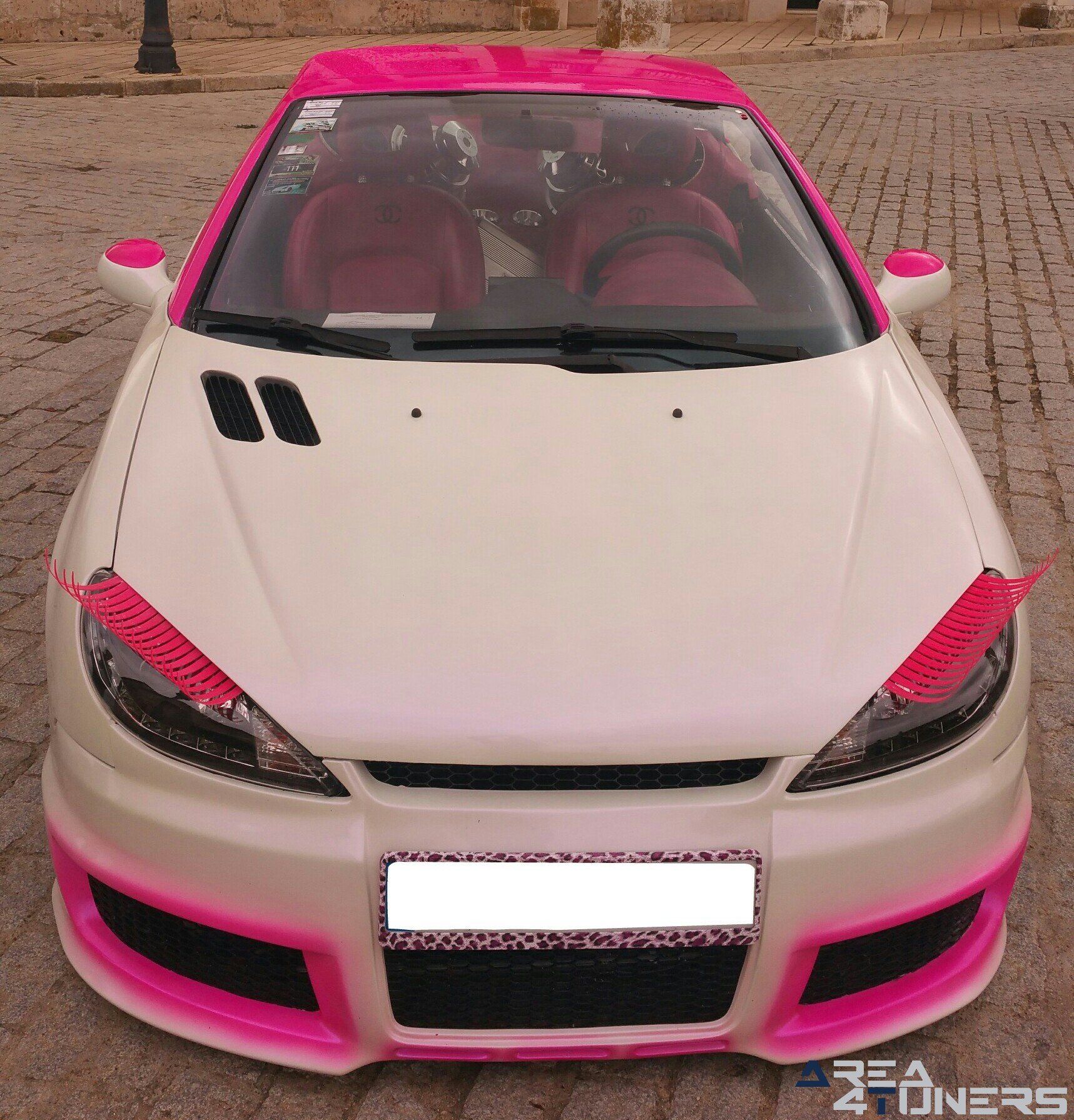 Imagen reportaje coche Tuning Peugeot 206 Mirada Femenina Imagen perteneciente al reportaje fotográfico de la revista Tuning de publicación diaria Area4tuners.es sobre un Peugeot 206