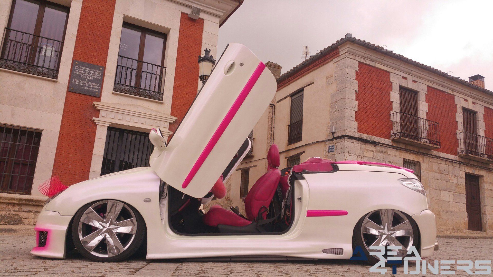 Imagen reportaje coche Tuning Peugeot 206 Mirada Femenina Imagen perteneciente al reportaje fotográfico de la revista Tuning de publicación diaria Area4tuners.es sobre un Peugeot 206