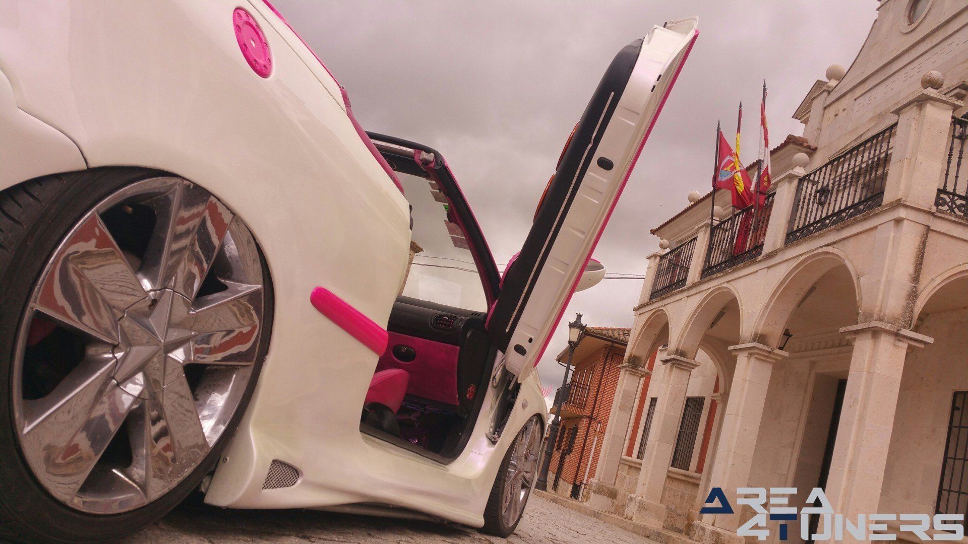 Imagen reportaje coche Tuning Peugeot 206 Mirada Femenina Imagen perteneciente al reportaje fotográfico de la revista Tuning de publicación diaria Area4tuners.es sobre un Peugeot 206