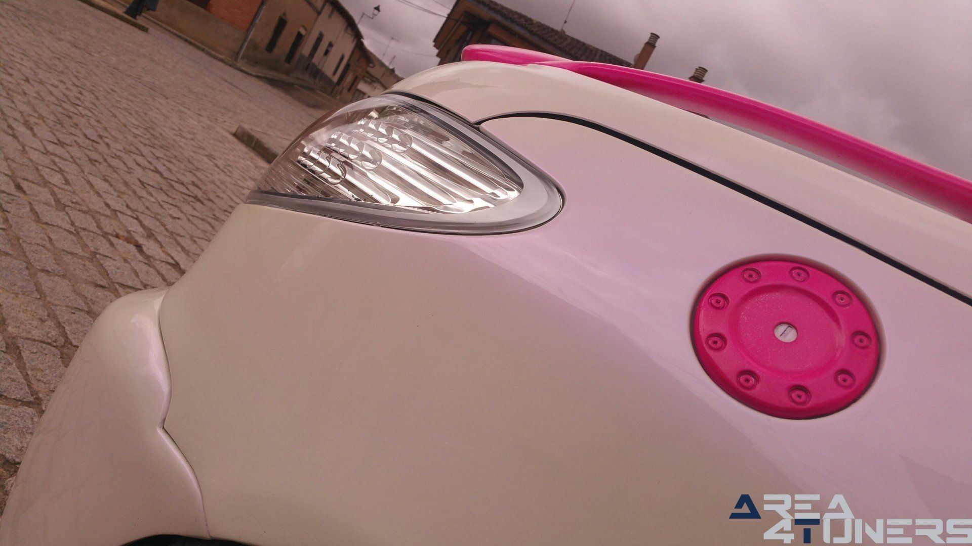 Imagen reportaje coche Tuning Peugeot 206 Mirada Femenina Imagen perteneciente al reportaje fotográfico de la revista Tuning de publicación diaria Area4tuners.es sobre un Peugeot 206