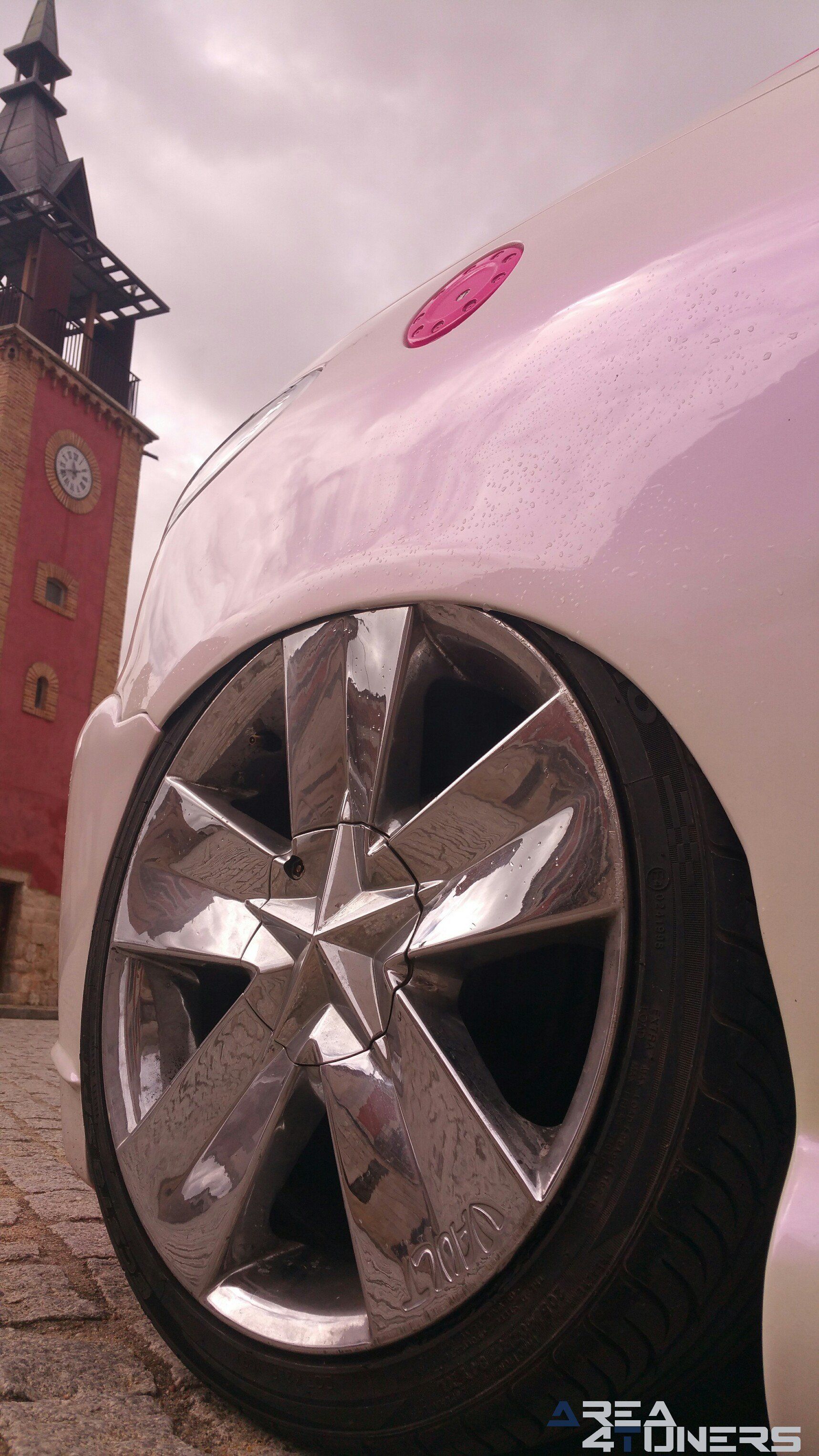Imagen reportaje coche Tuning Peugeot 206 Mirada Femenina Imagen perteneciente al reportaje fotográfico de la revista Tuning de publicación diaria Area4tuners.es sobre un Peugeot 206