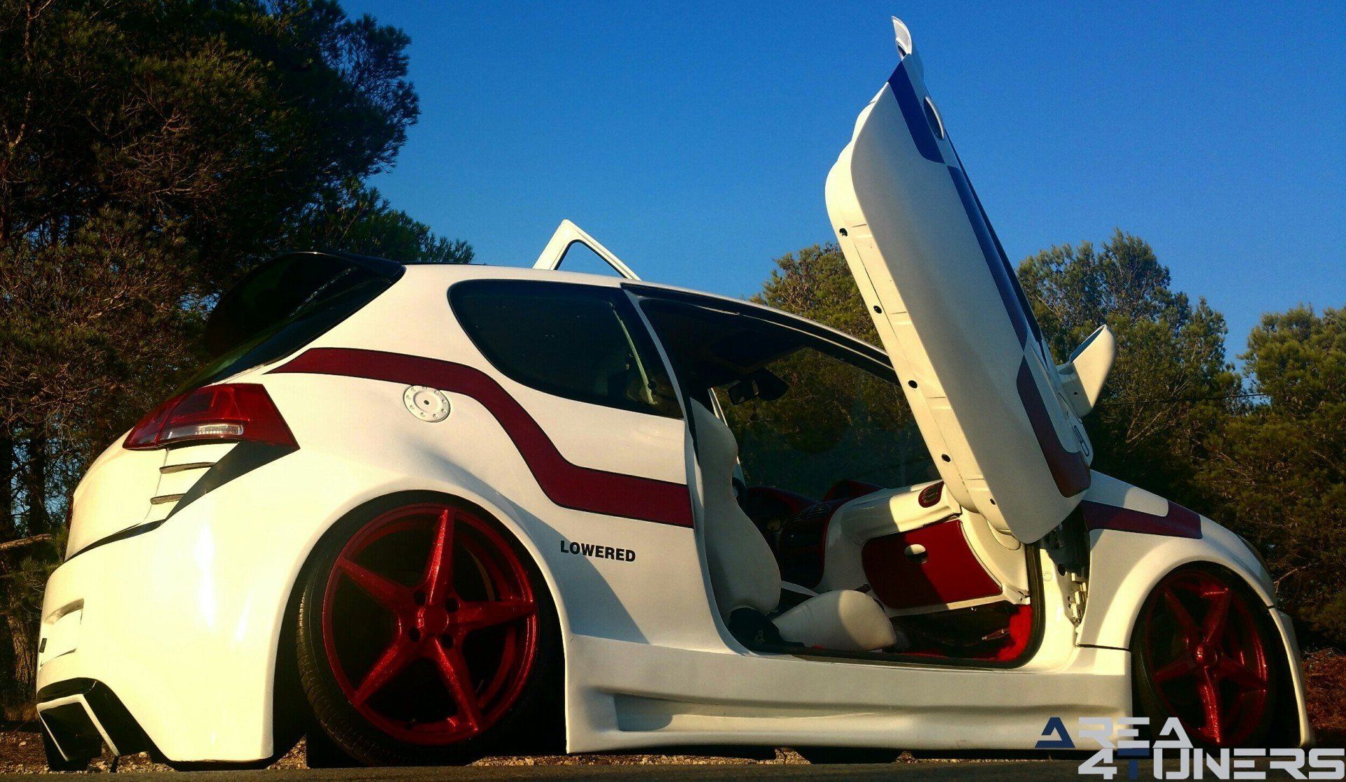 Imagen reportaje coche Tuning Peugeot 206 Doscirocco Imagen perteneciente al reportaje de coche Tuning, de la revista Area4tuners.es sobre un Peugeot 206