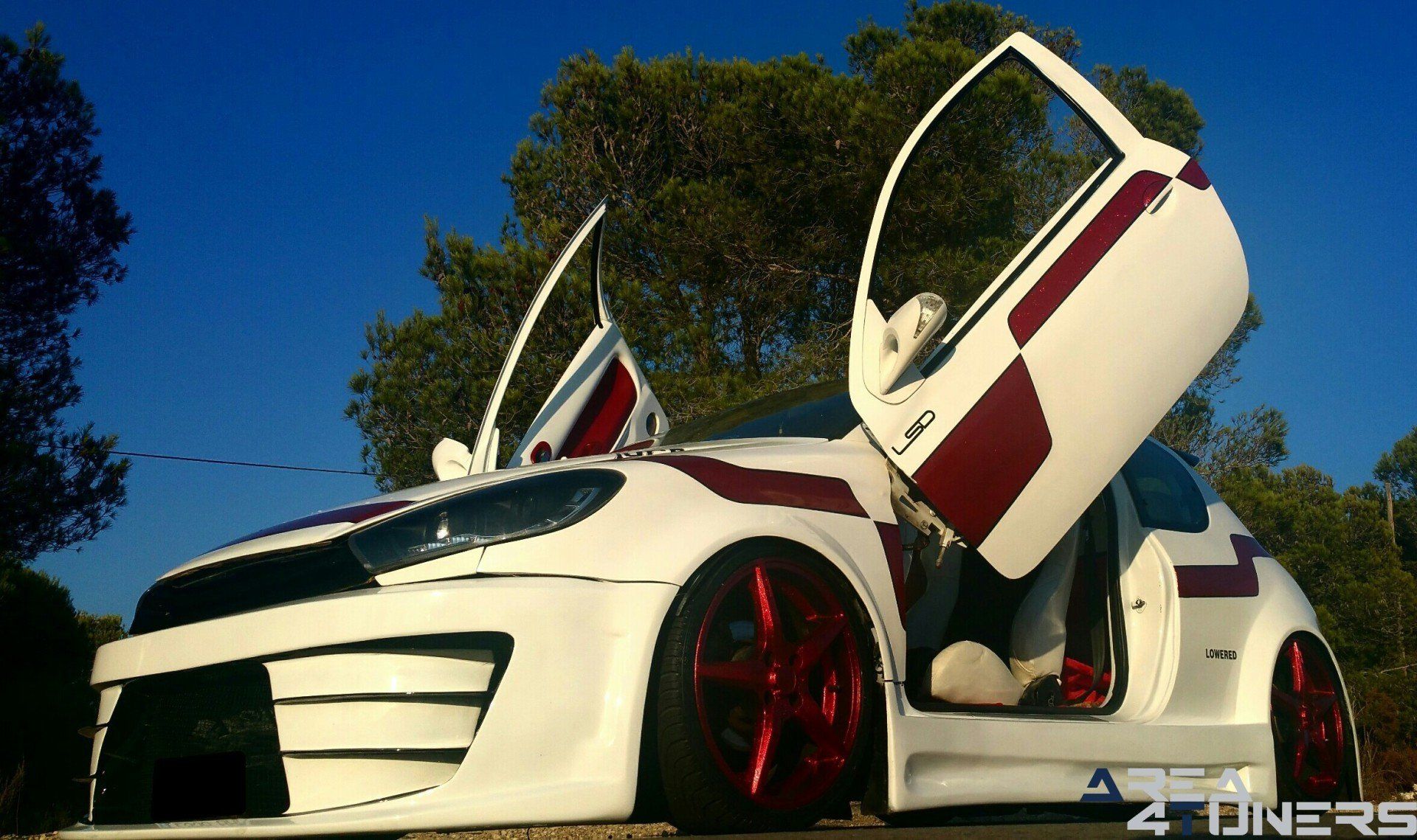 Imagen reportaje coche Tuning Peugeot 206 Doscirocco Imagen perteneciente al reportaje de coche Tuning, de la revista Area4tuners.es sobre un Peugeot 206