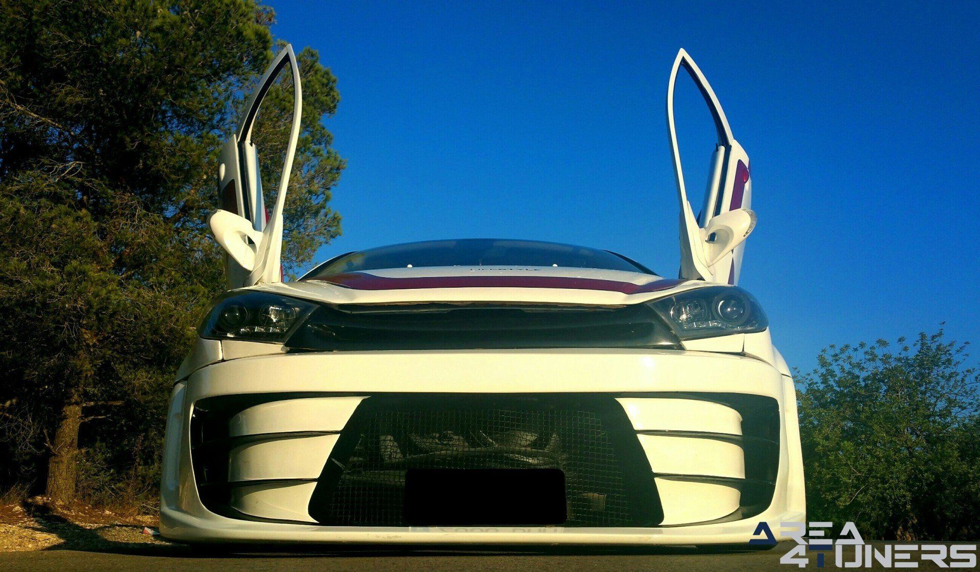 Imagen reportaje coche Tuning Peugeot 206 Doscirocco Imagen perteneciente al reportaje de coche Tuning, de la revista Area4tuners.es sobre un Peugeot 206