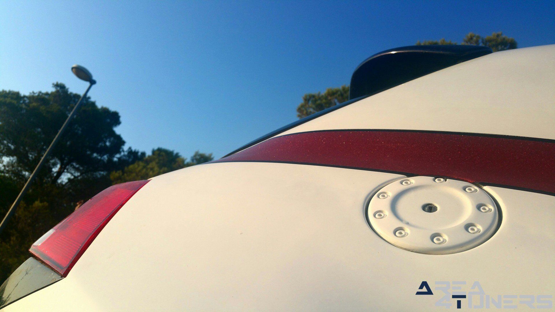 Imagen reportaje coche Tuning Peugeot 206 Doscirocco Imagen perteneciente al reportaje de coche Tuning, de la revista Area4tuners.es sobre un Peugeot 206