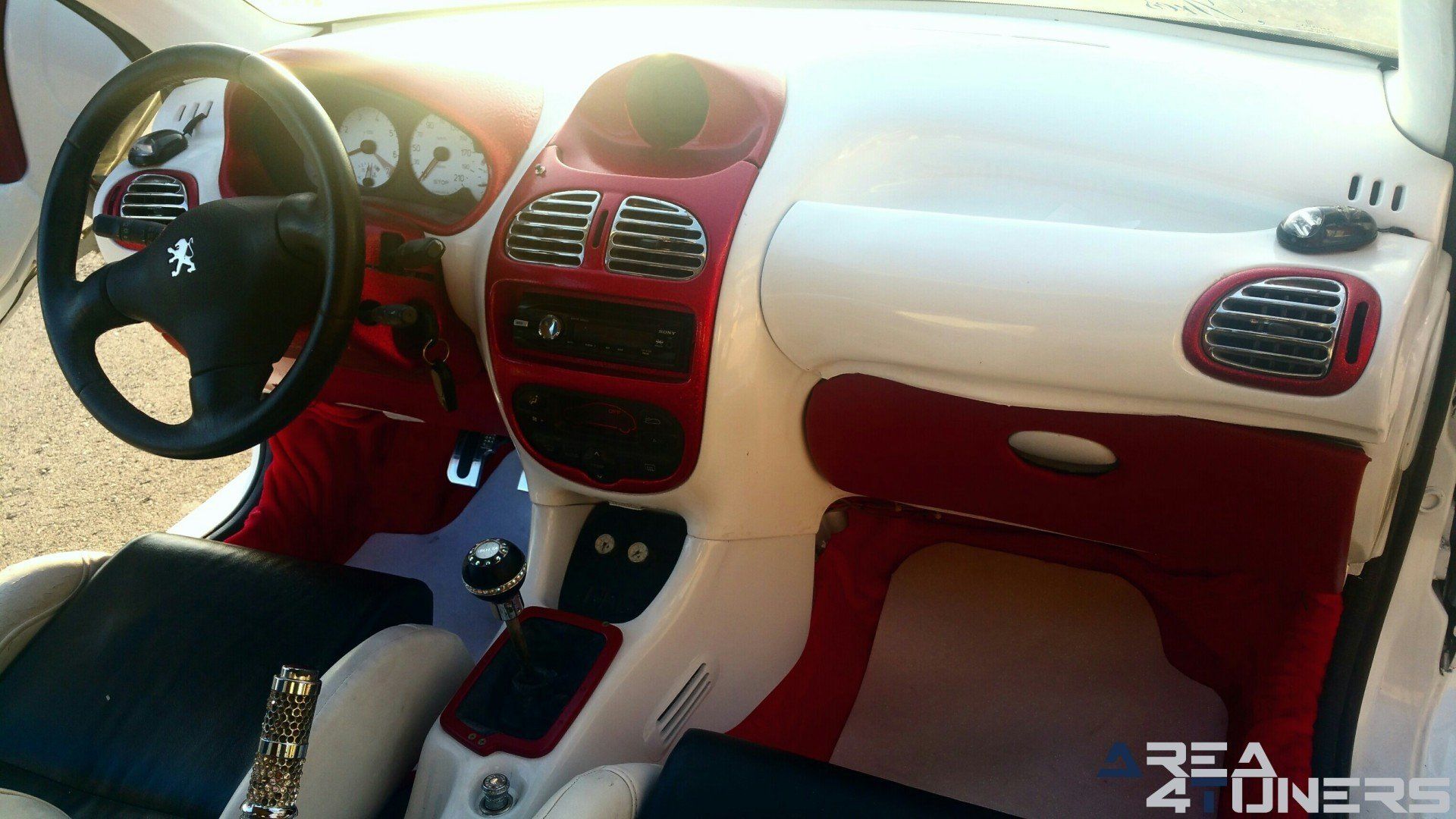 Imagen reportaje coche Tuning Peugeot 206 Doscirocco Imagen perteneciente al reportaje de coche Tuning, de la revista Area4tuners.es sobre un Peugeot 206