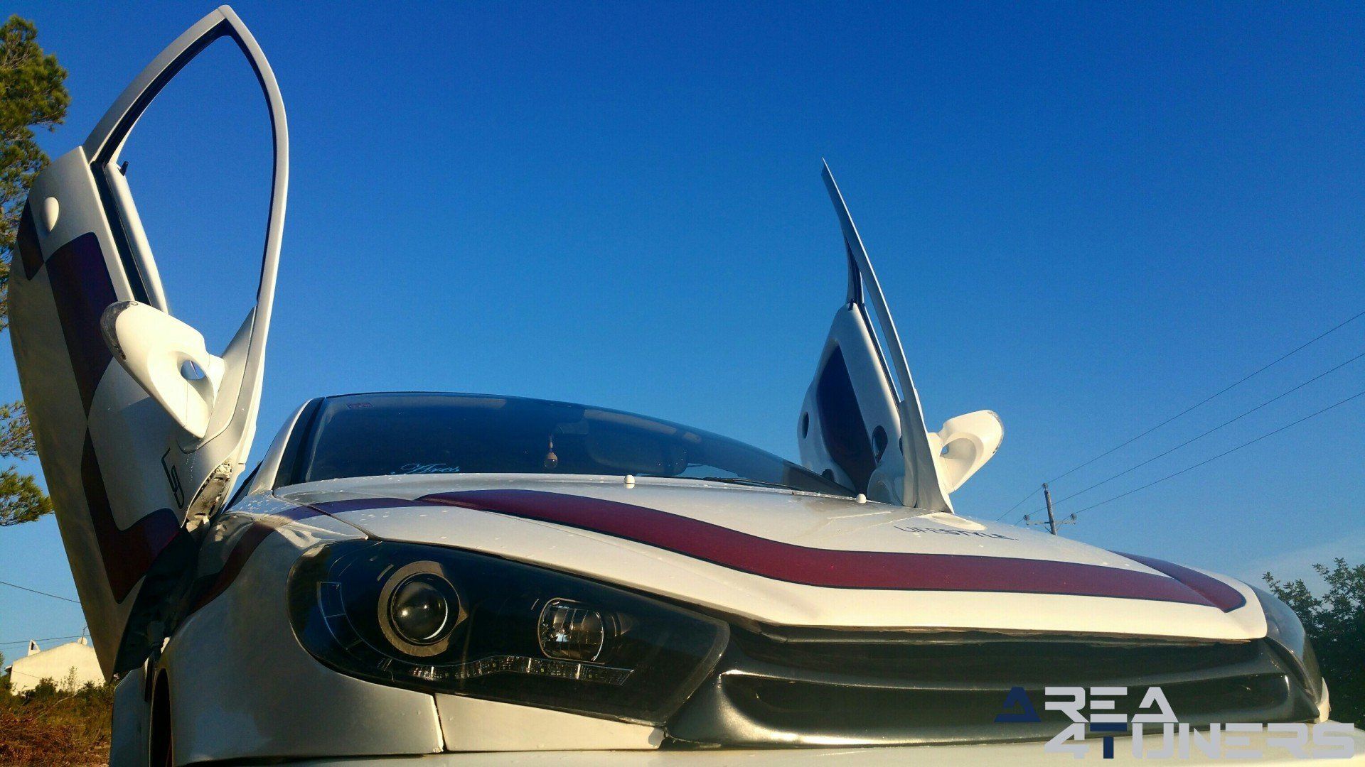 Imagen reportaje coche Tuning Peugeot 206 Doscirocco Imagen perteneciente al reportaje de coche Tuning, de la revista Area4tuners.es sobre un Peugeot 206