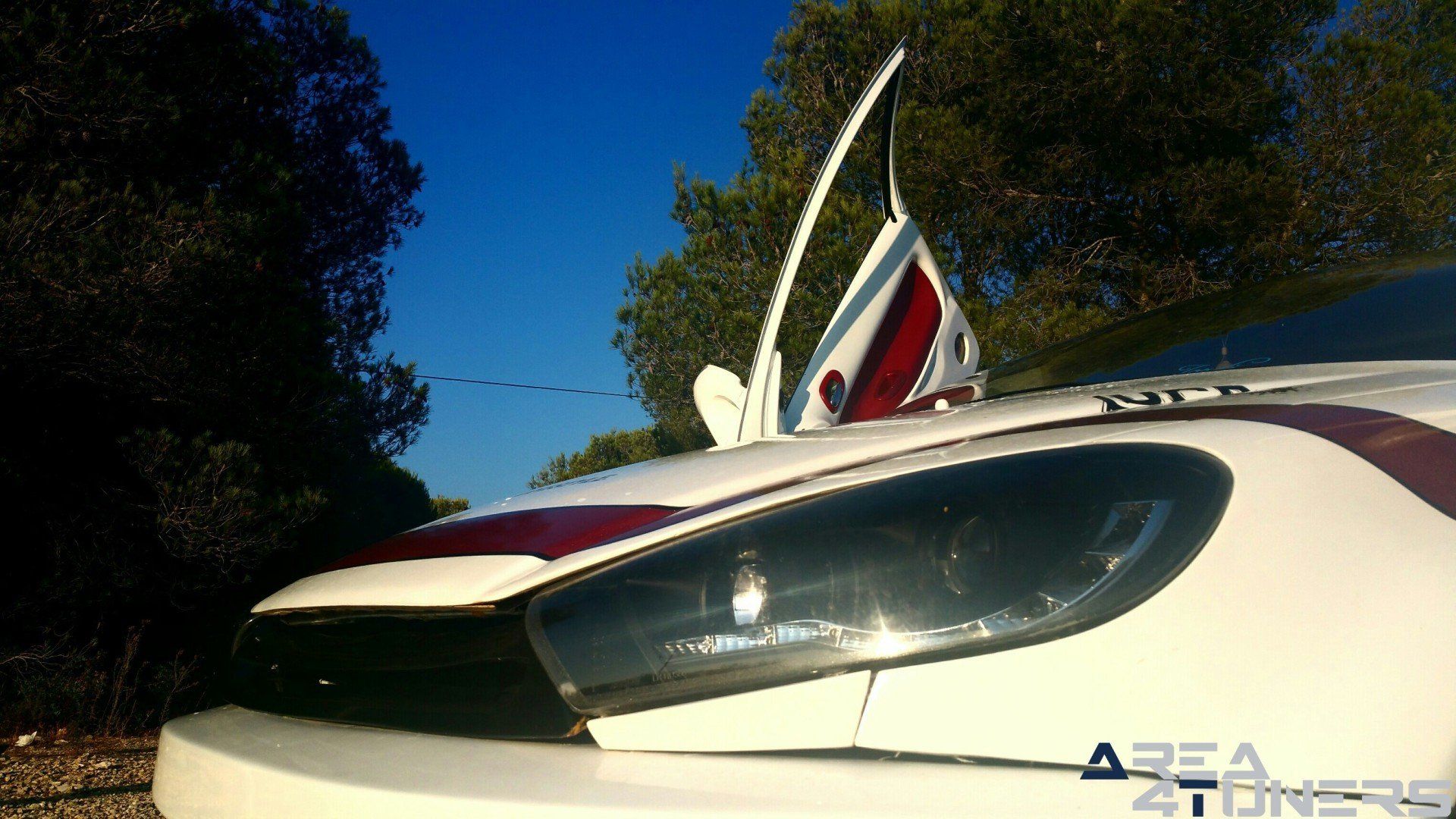 Imagen reportaje coche Tuning Peugeot 206 Doscirocco Imagen perteneciente al reportaje de coche Tuning, de la revista Area4tuners.es sobre un Peugeot 206