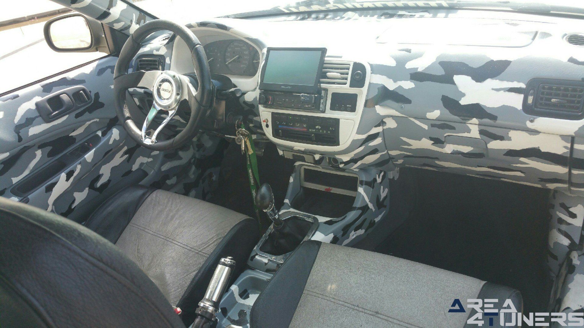 Imagen reportaje coche Tuning Honda Civic Coupé Kamikaze Imagen perteneciente al reportaje de coche Tuning, de la revista Area4tuners.es sobre un Honda Civic