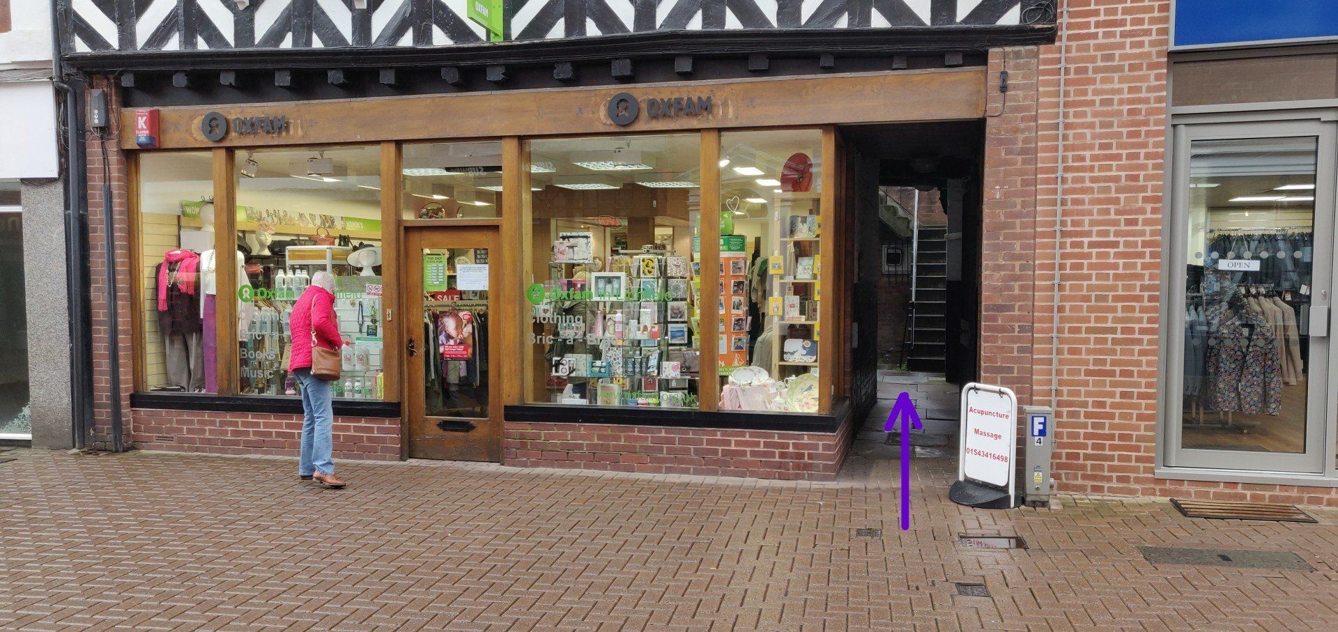 Go up the stairs through the passage way between the Oxfam shop and Michaels Menswear. Chinese Massage Therapy