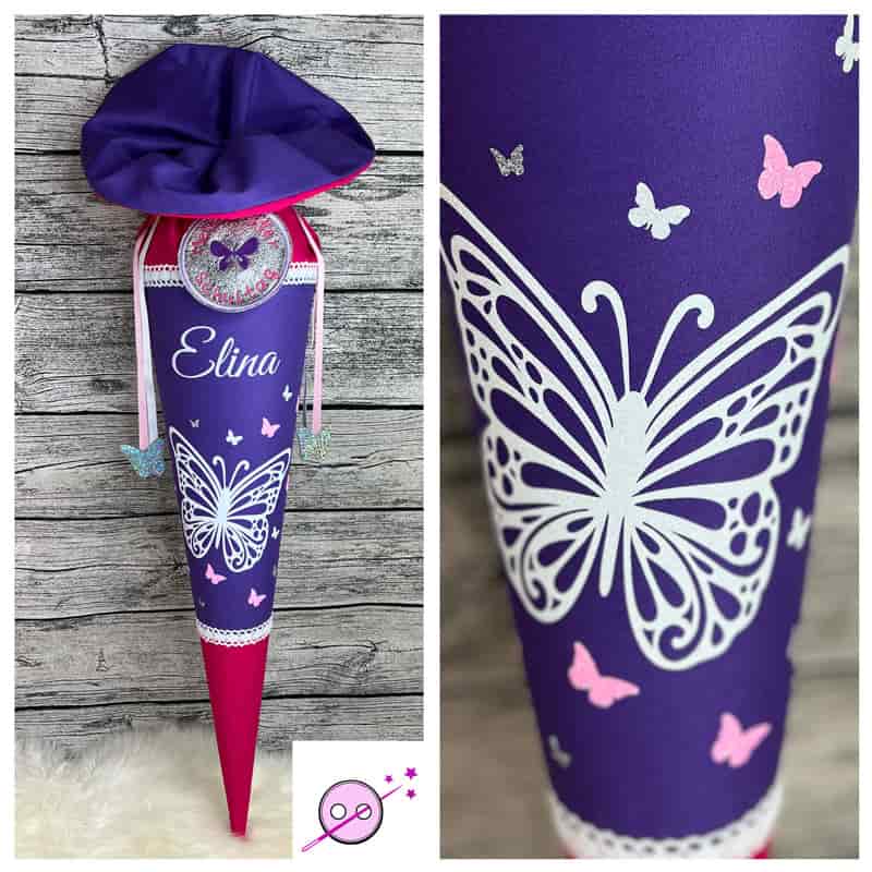 Schultüte mit einem Schmietterling in Pink und lila und ganz viel Glitzer