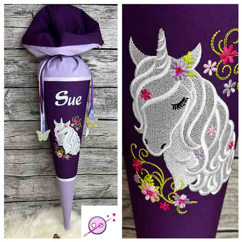 edle Schultüte mit Einhornmotiv in weiß, flieder und lila.