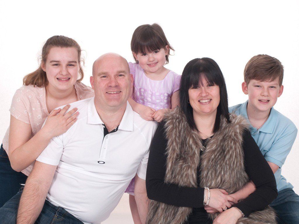 family portraiture mum dad and son and two daughters