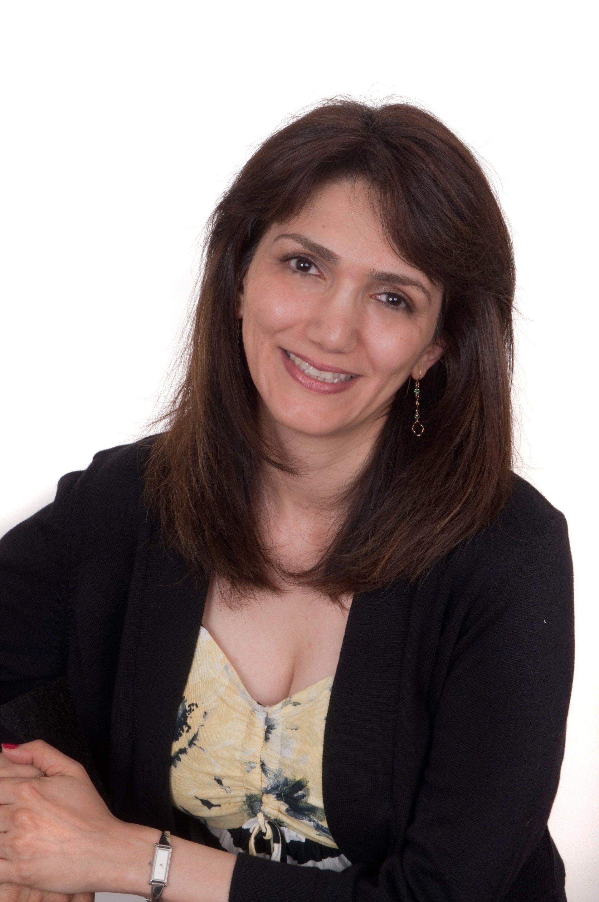 business portrait of a lady against a plain white background