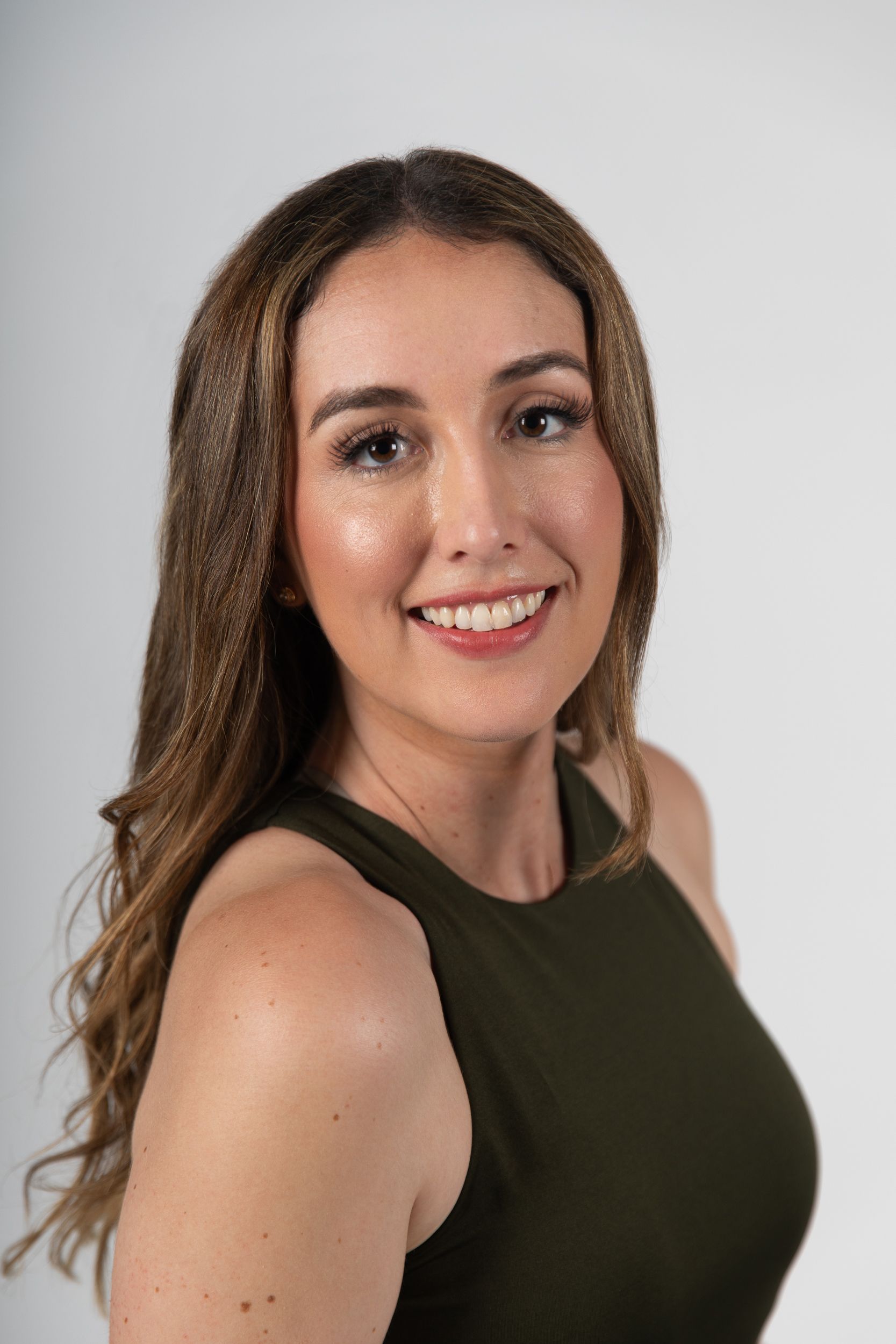 Classic headshot on white backdrop for actress in Los Angeles