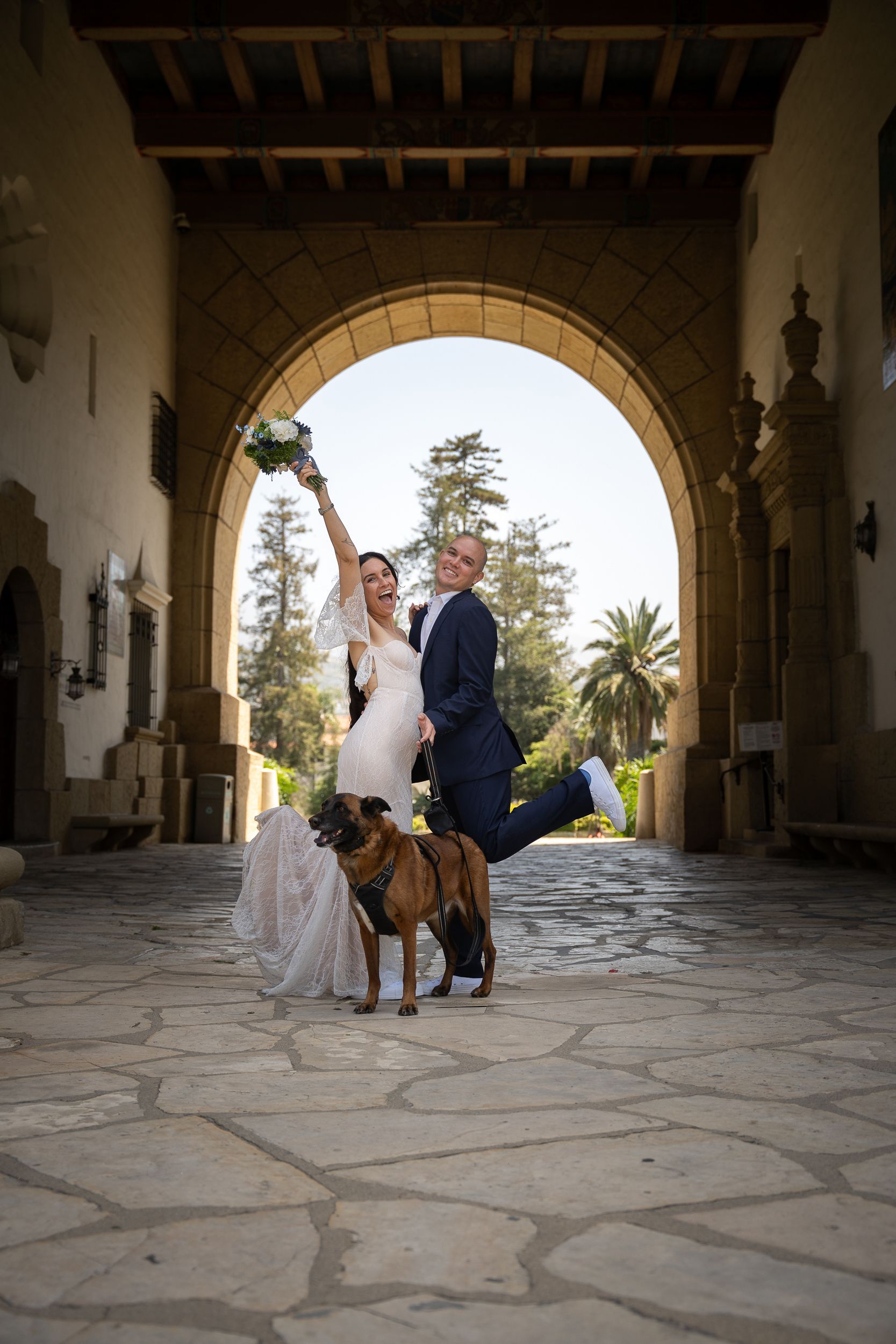 Danielle and Troy elopement captured by wedding photo and video team, POP Media LA, at the Santa Barbara Courthouse in Santa Barbara, California.