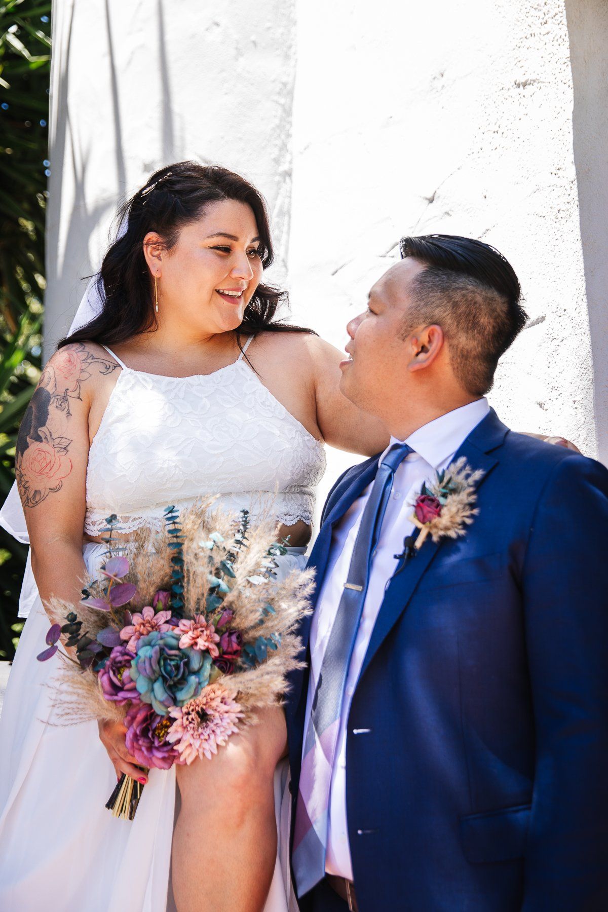 Duc and Marcie elopement captured by wedding photo and video team, POP Media LA, at the Santa Barbara Courthouse in Santa Barbara, California.