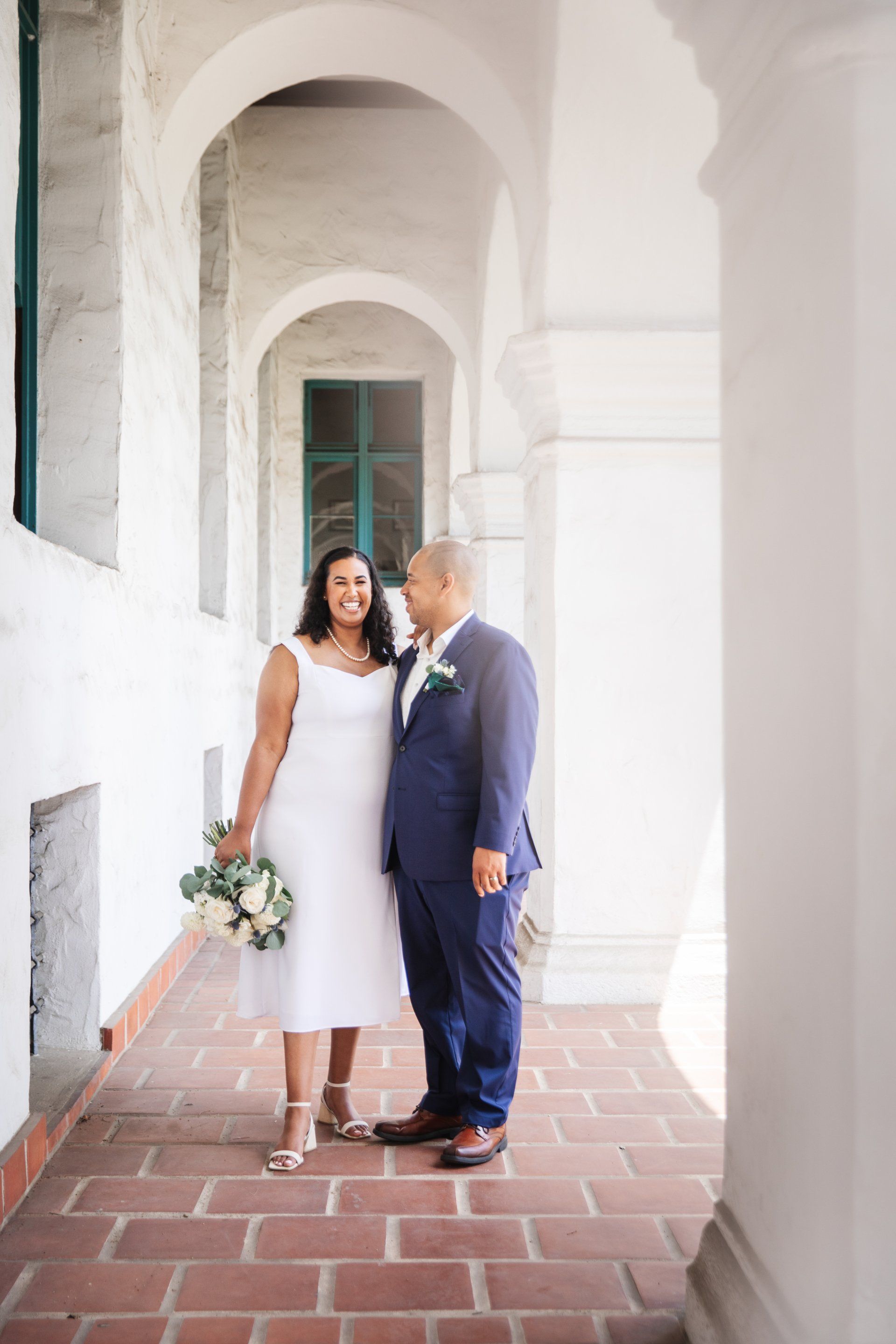 Sara and Jack elopement captured by wedding photo and video team, POP Media LA, at the Santa Barbara Courthouse in Santa Barbara, California.
