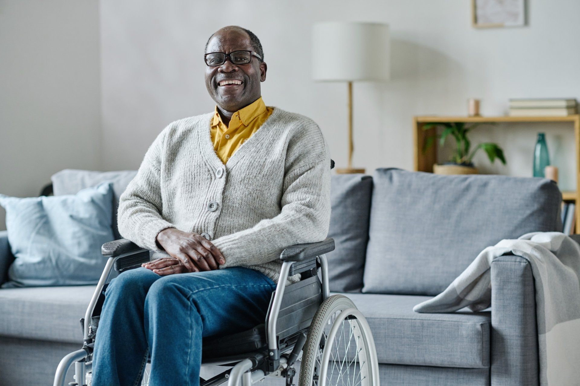 Person in a wheelchair smiling