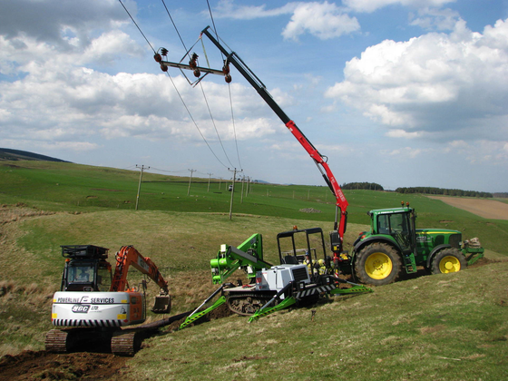 Replacement of electricty pole using diggers and crane