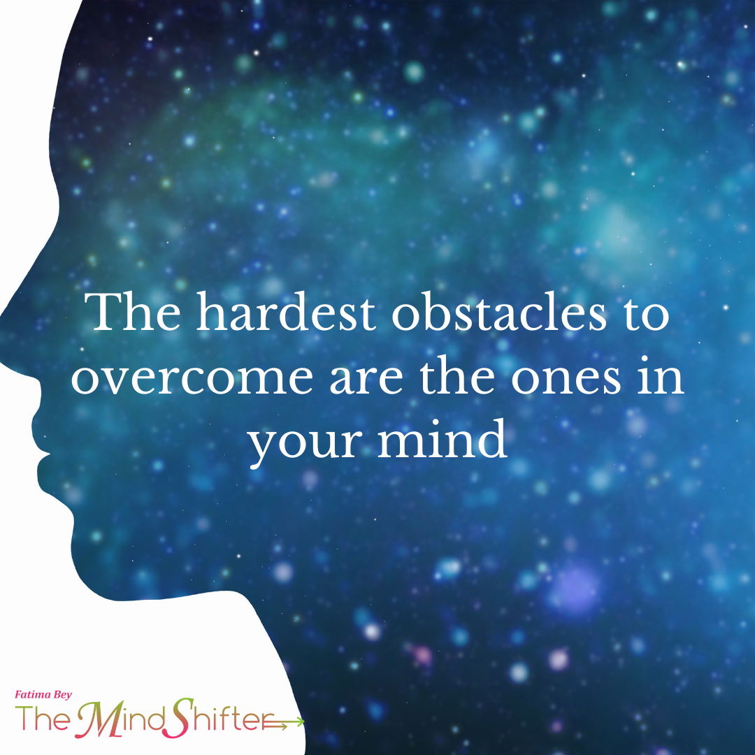 Silhouette of head with galaxy background. Quote: “Hardest obstacles are in your mind”—Fatima Bey’s MindShift on mental barriers.