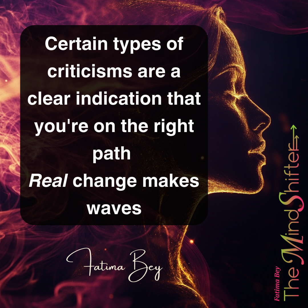 A glowing profile of a woman outlined in gold light with a bold quote about criticism and real chang