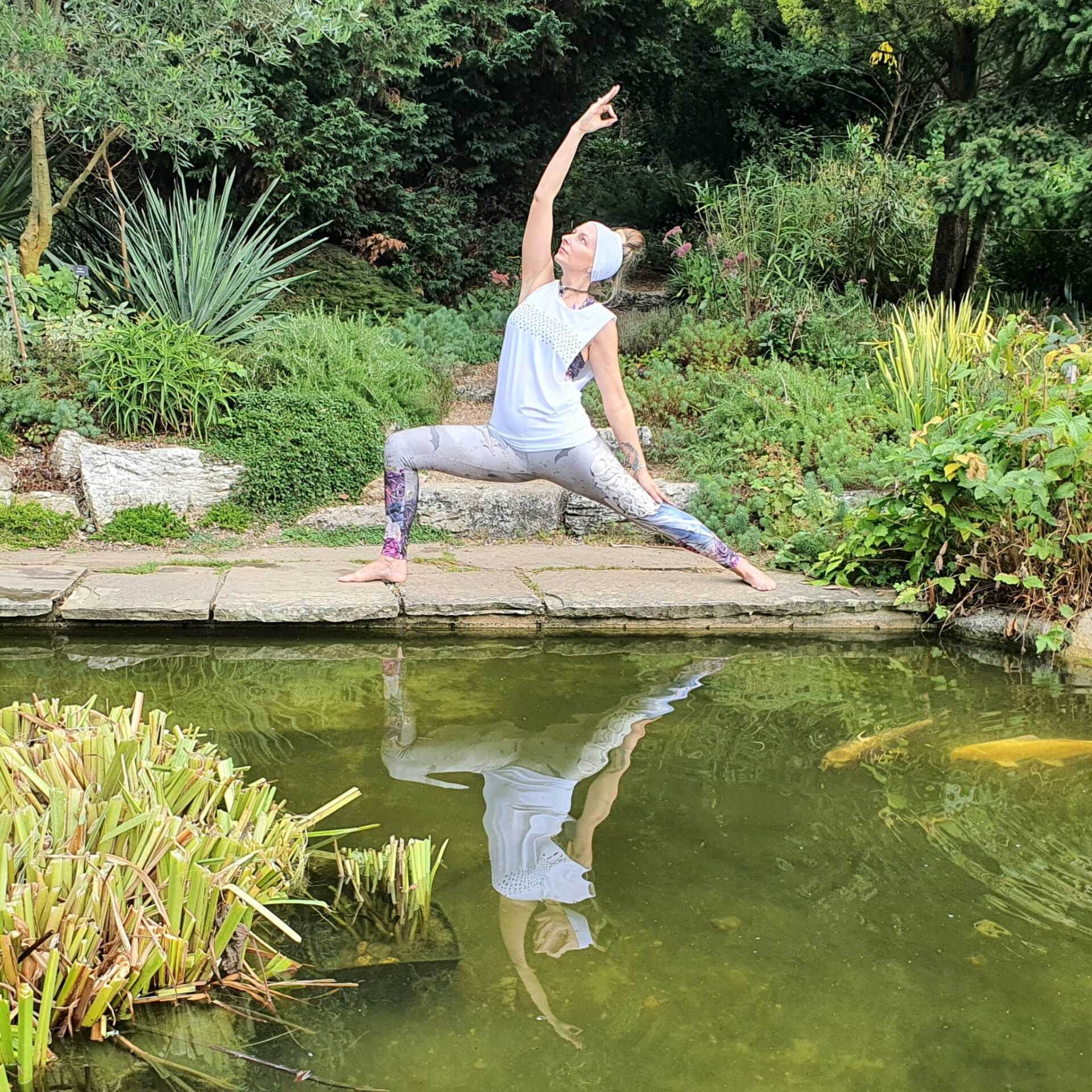 Peaceful Warrior by the water Woman doing yoga