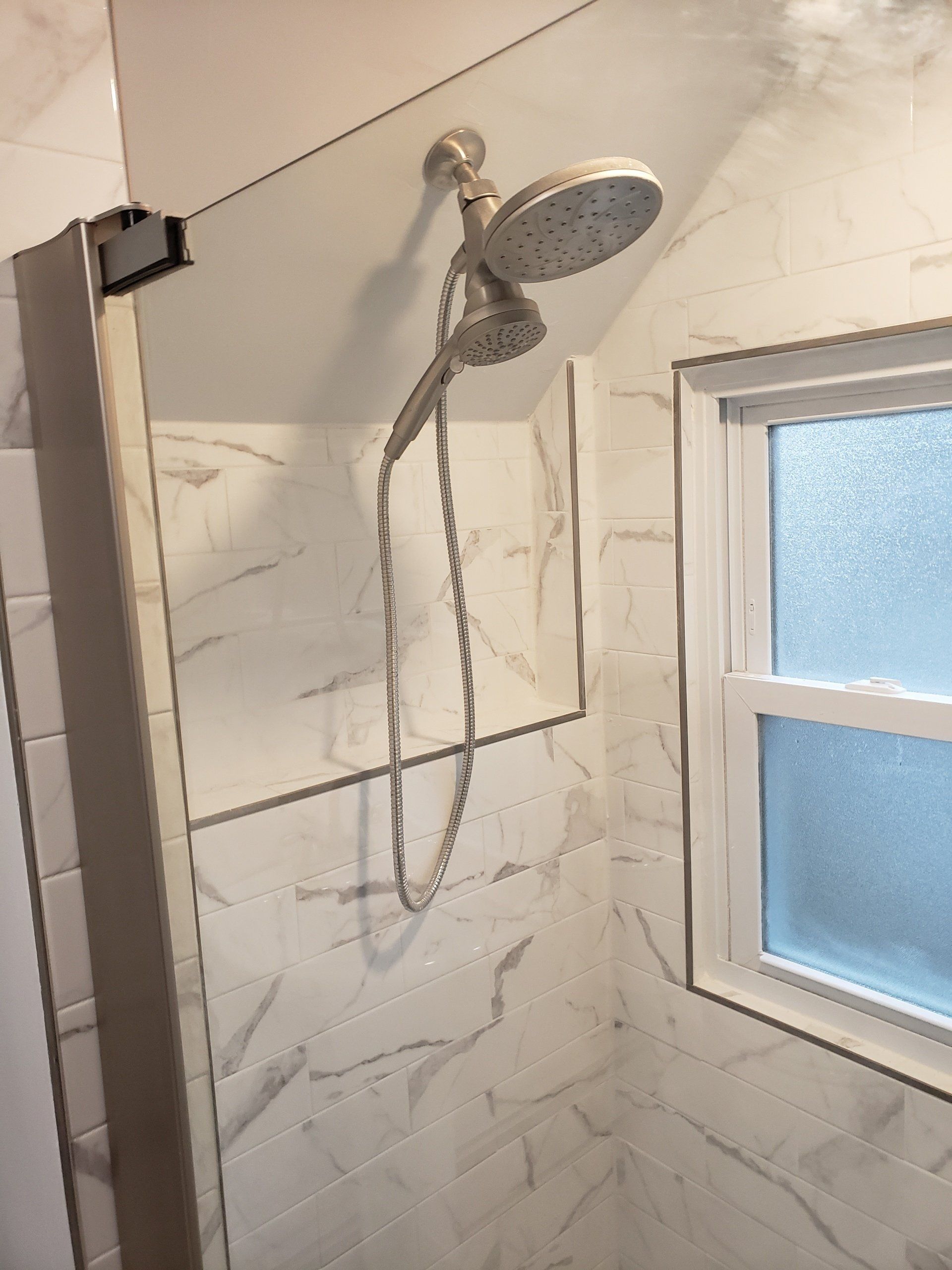 modern bathroom remodel with white marble
