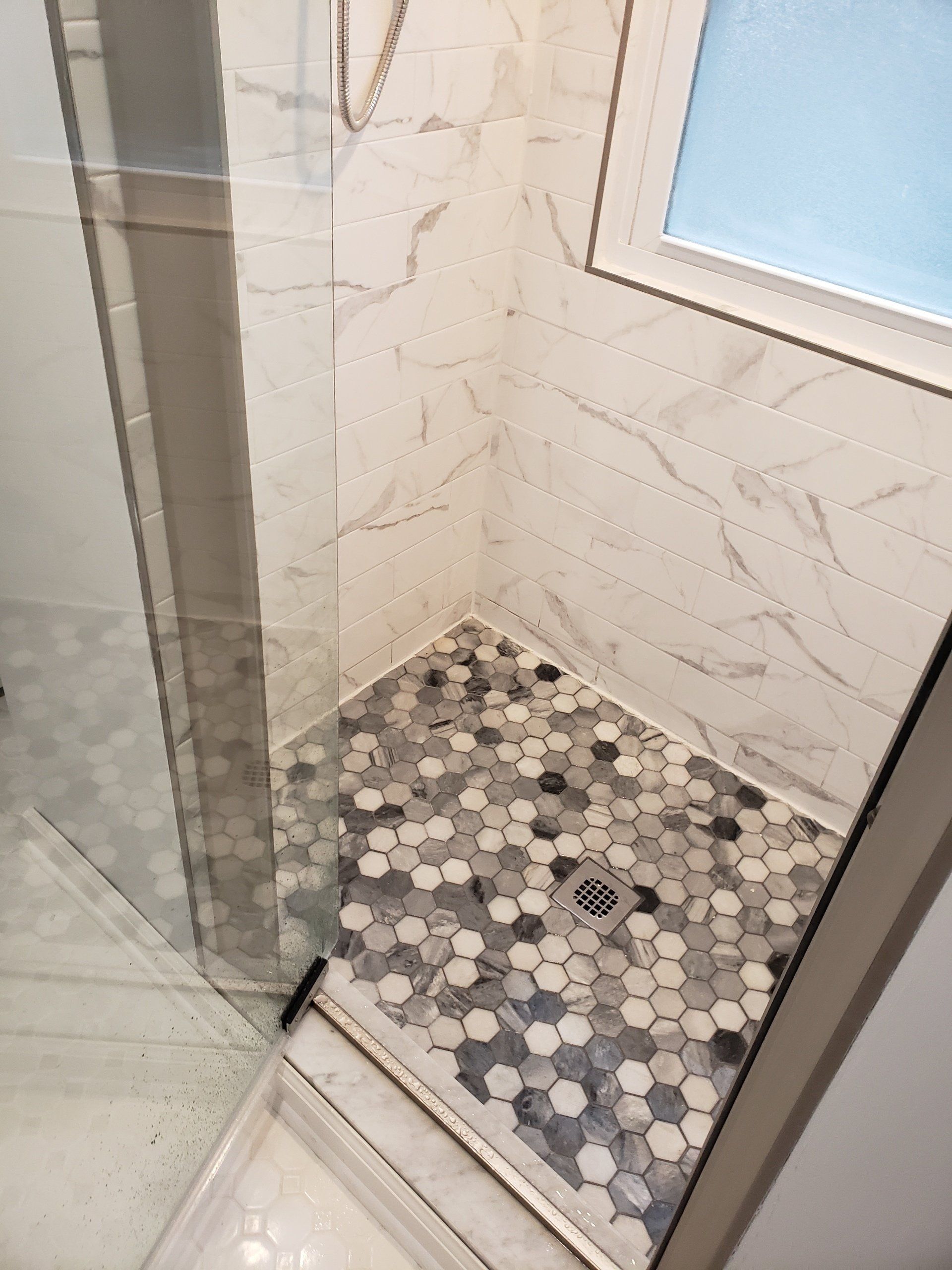 modern bathroom tile flooring and shower walls