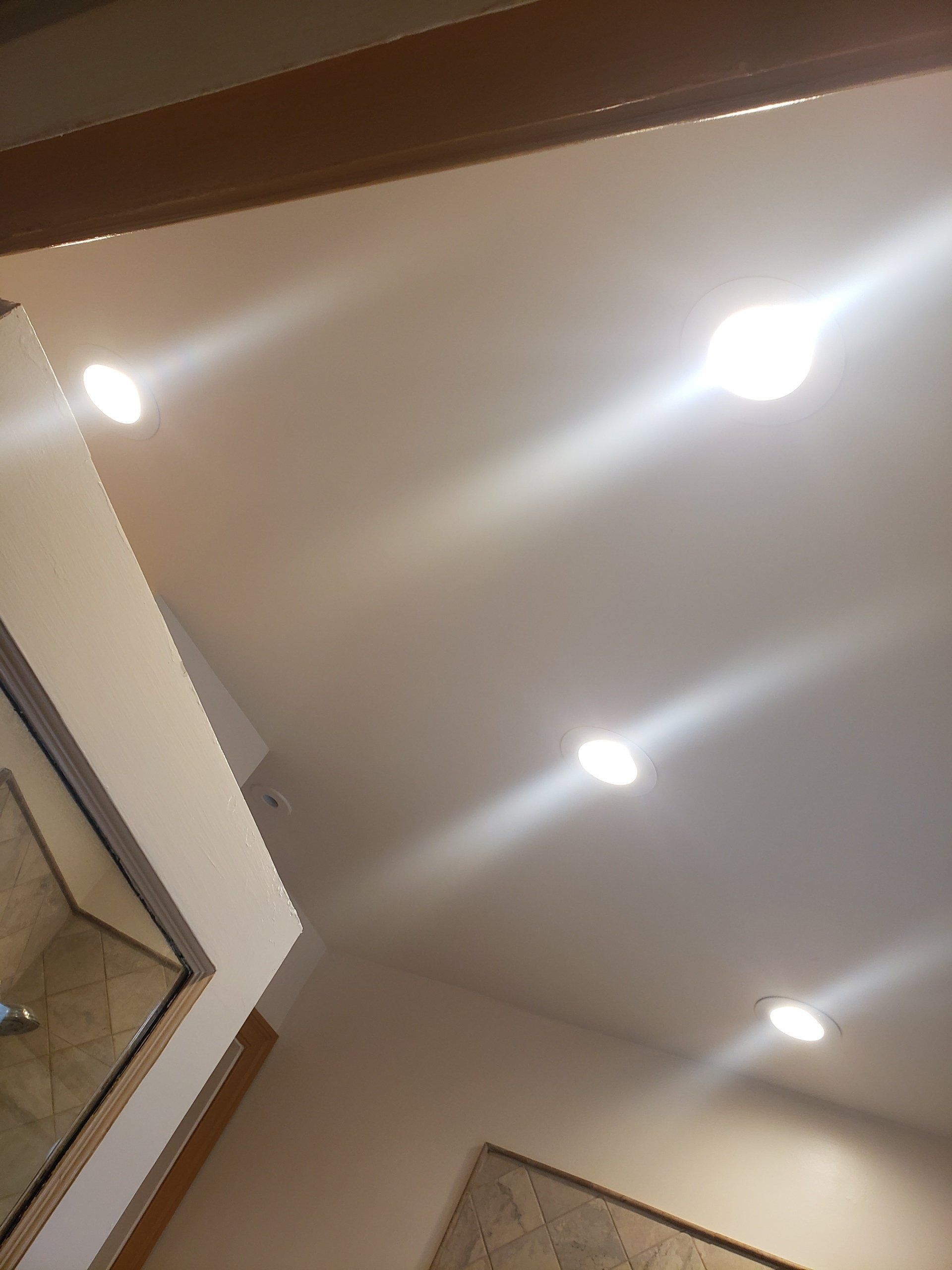 Five recessed lights replace previous dome light in Cheltenham bathroom remodel.