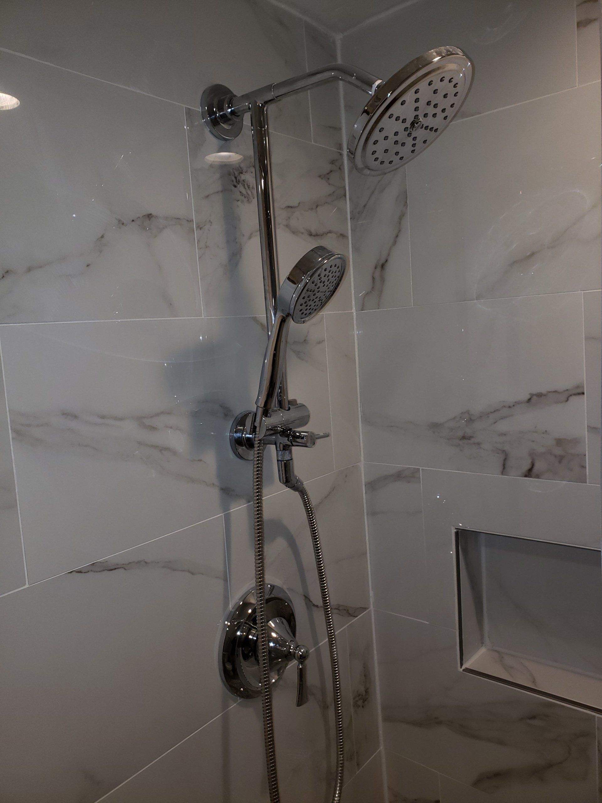 luxurious dual headed shower system in tub to shower conversion in jenkintown