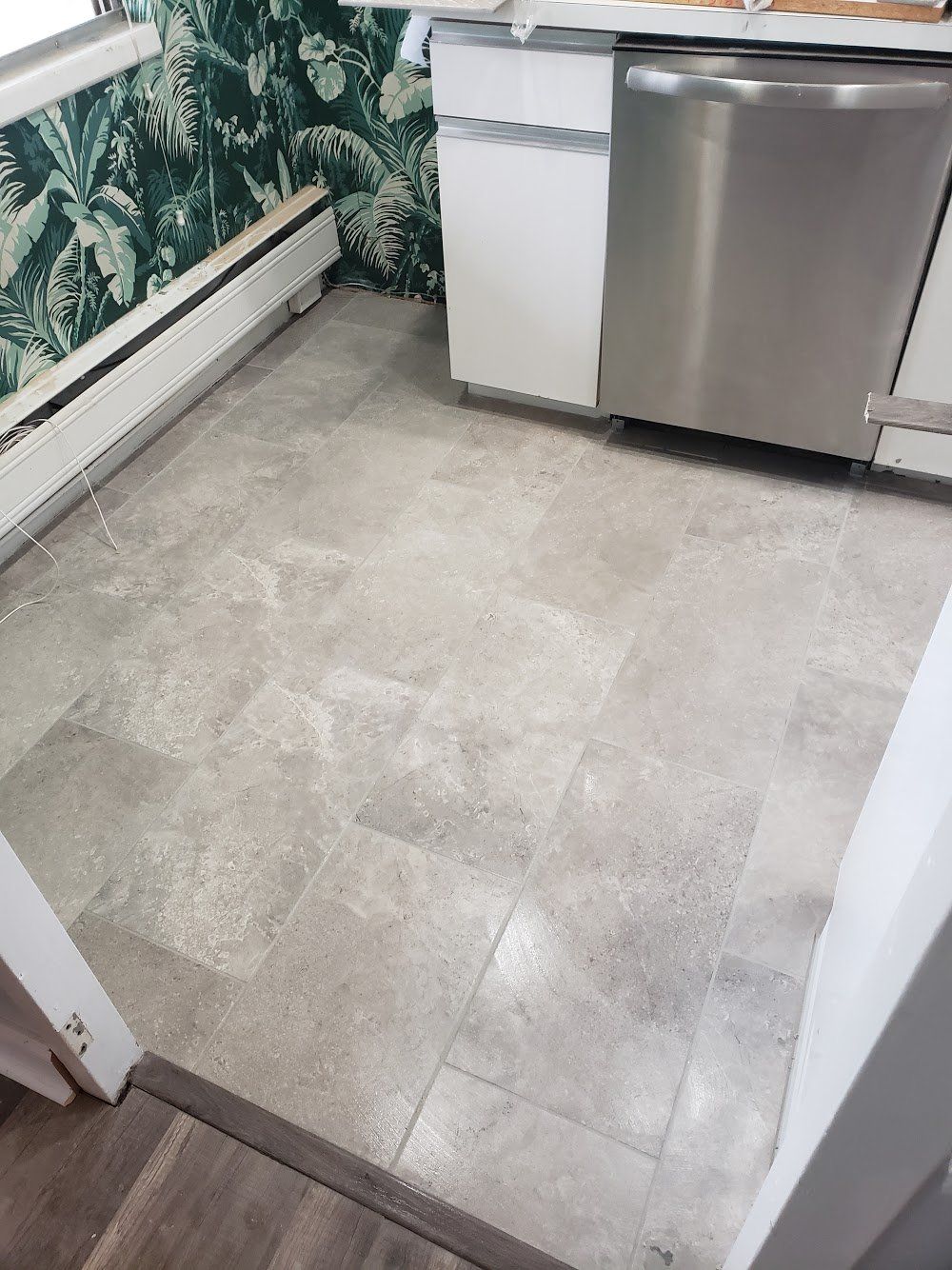 after photo of large format ceramic tile kitchen flooring installation in Elkins Park