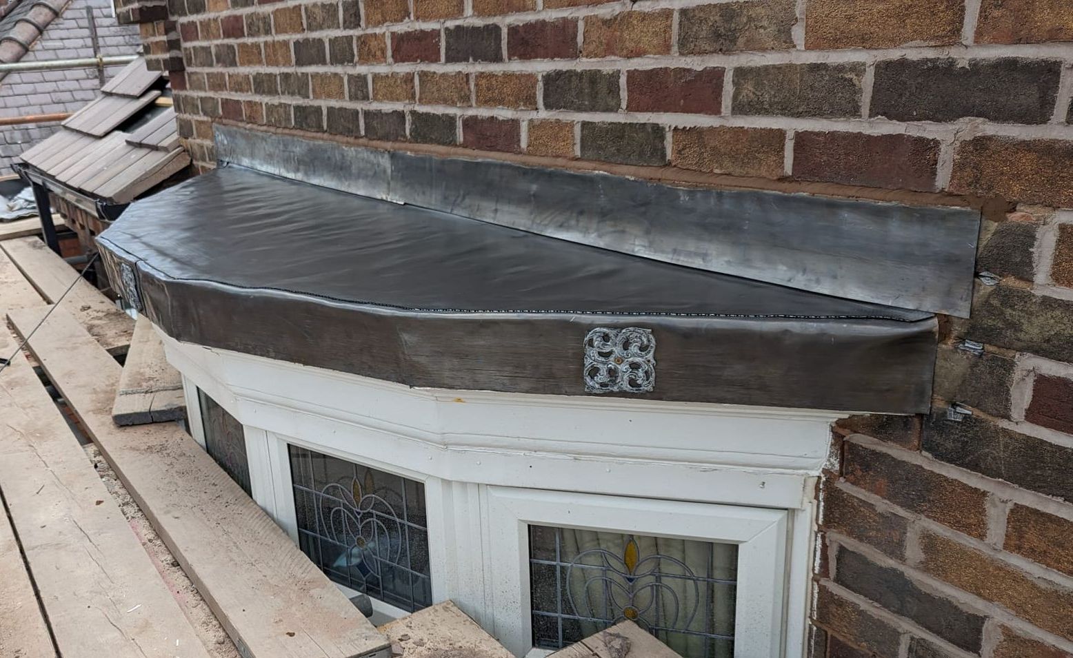 New lead bay roof