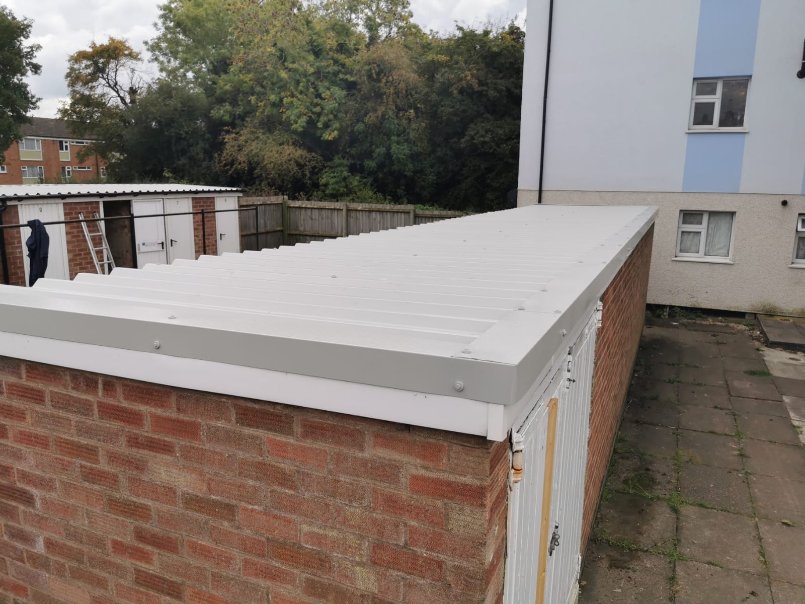Flat roof block housing association