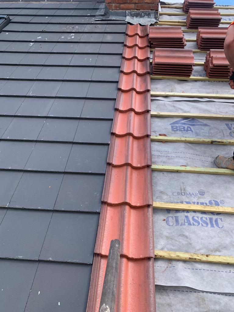 New slated and tiled roof