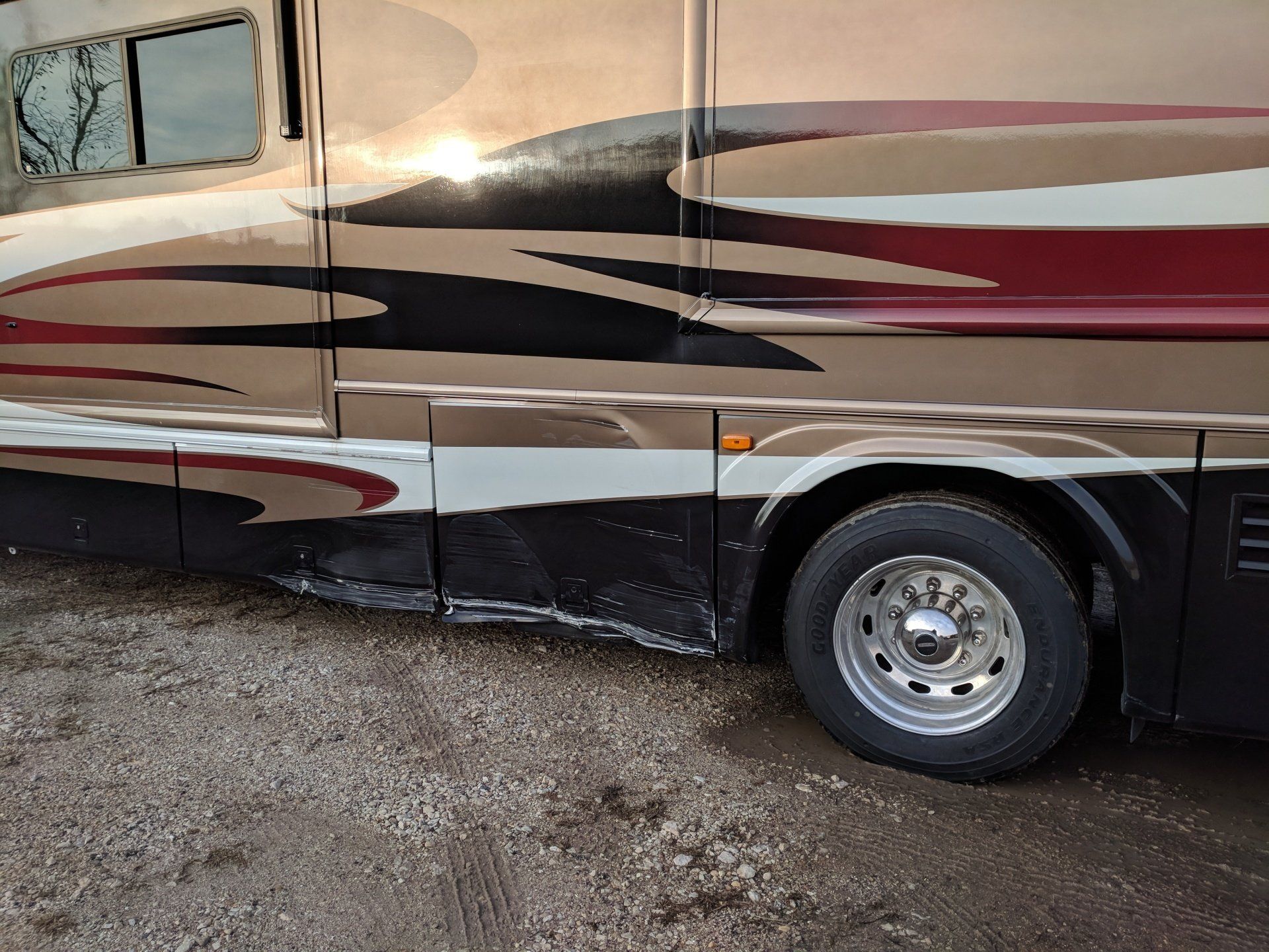 Roadside compartment door damage cut corners too tight