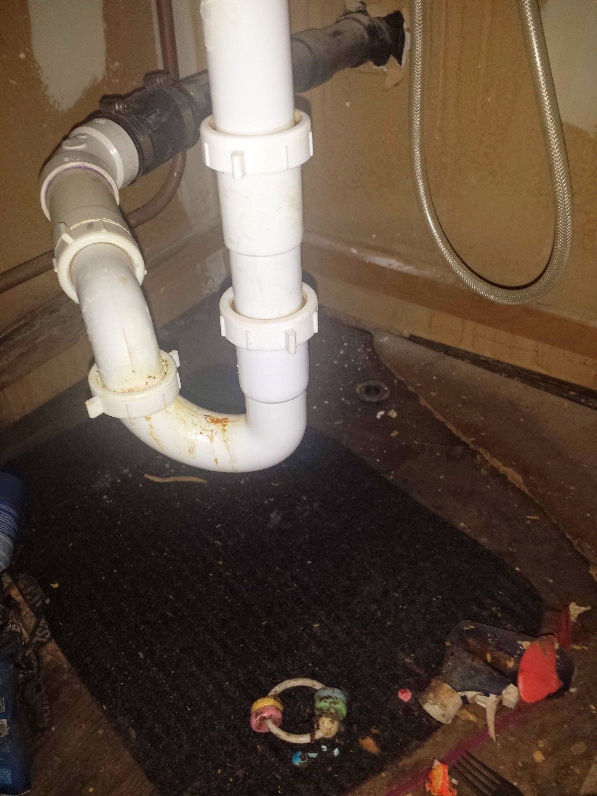 under the sink water leaks