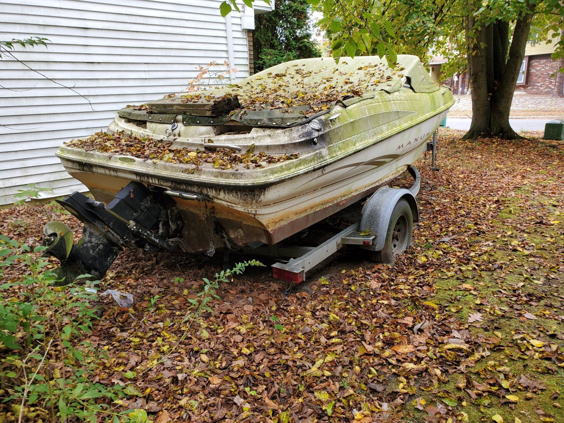 run down boat side of house russell hayek