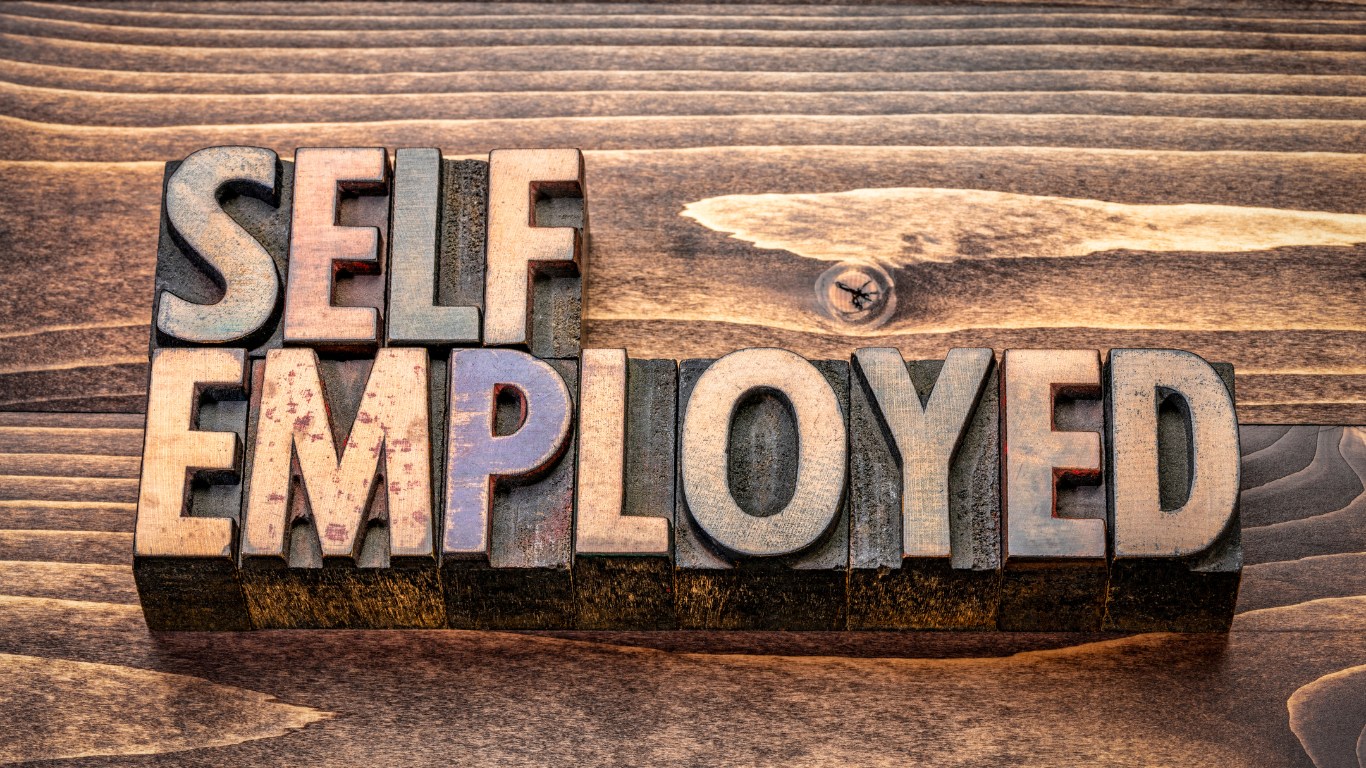 wooden blocks spell Self Employed