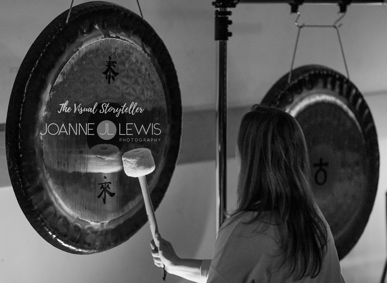 Gong being hit with a mallet