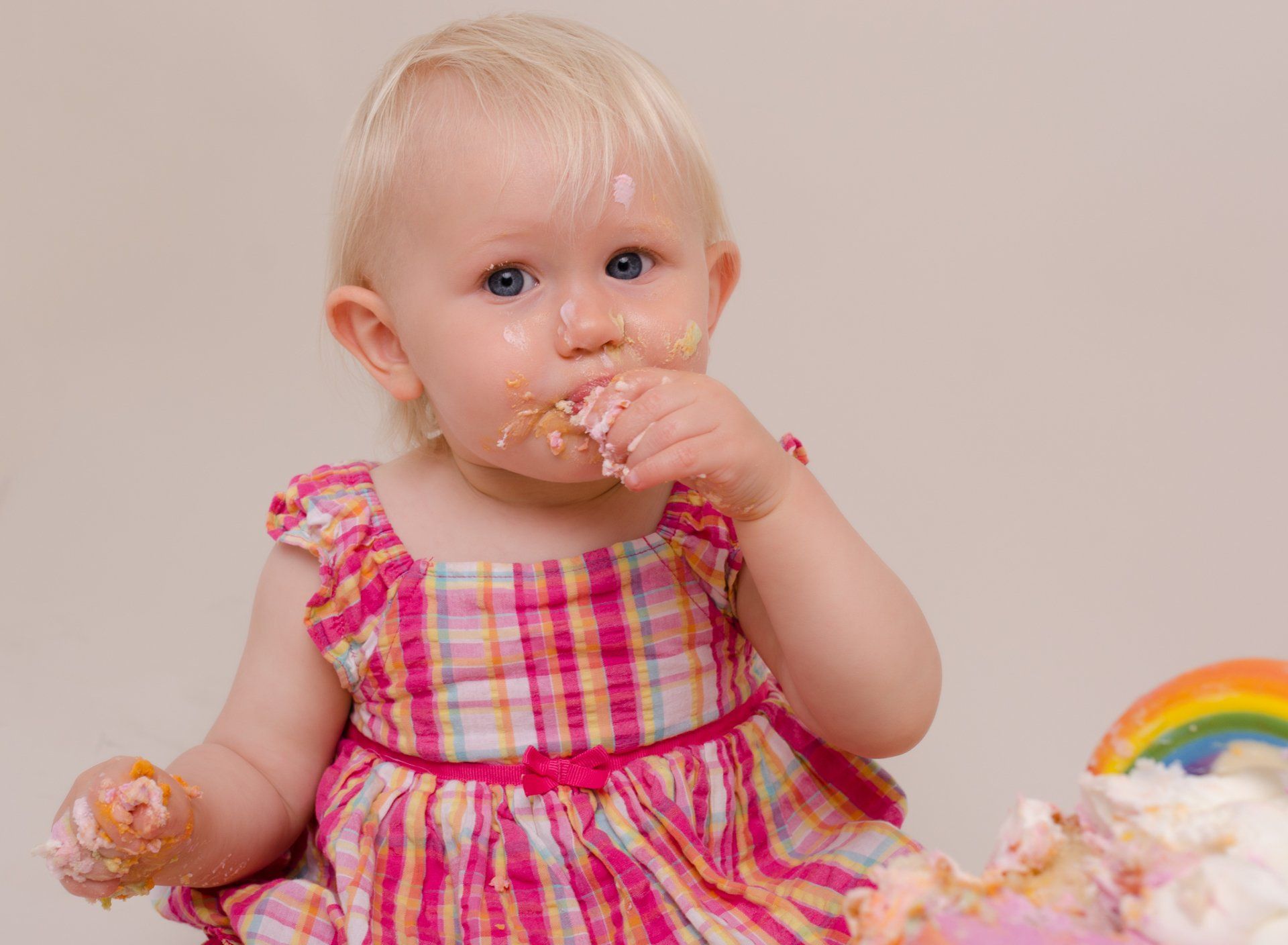 eating cake for photoshoot photographed by Joanne Lewis Photography in Hertford Studio