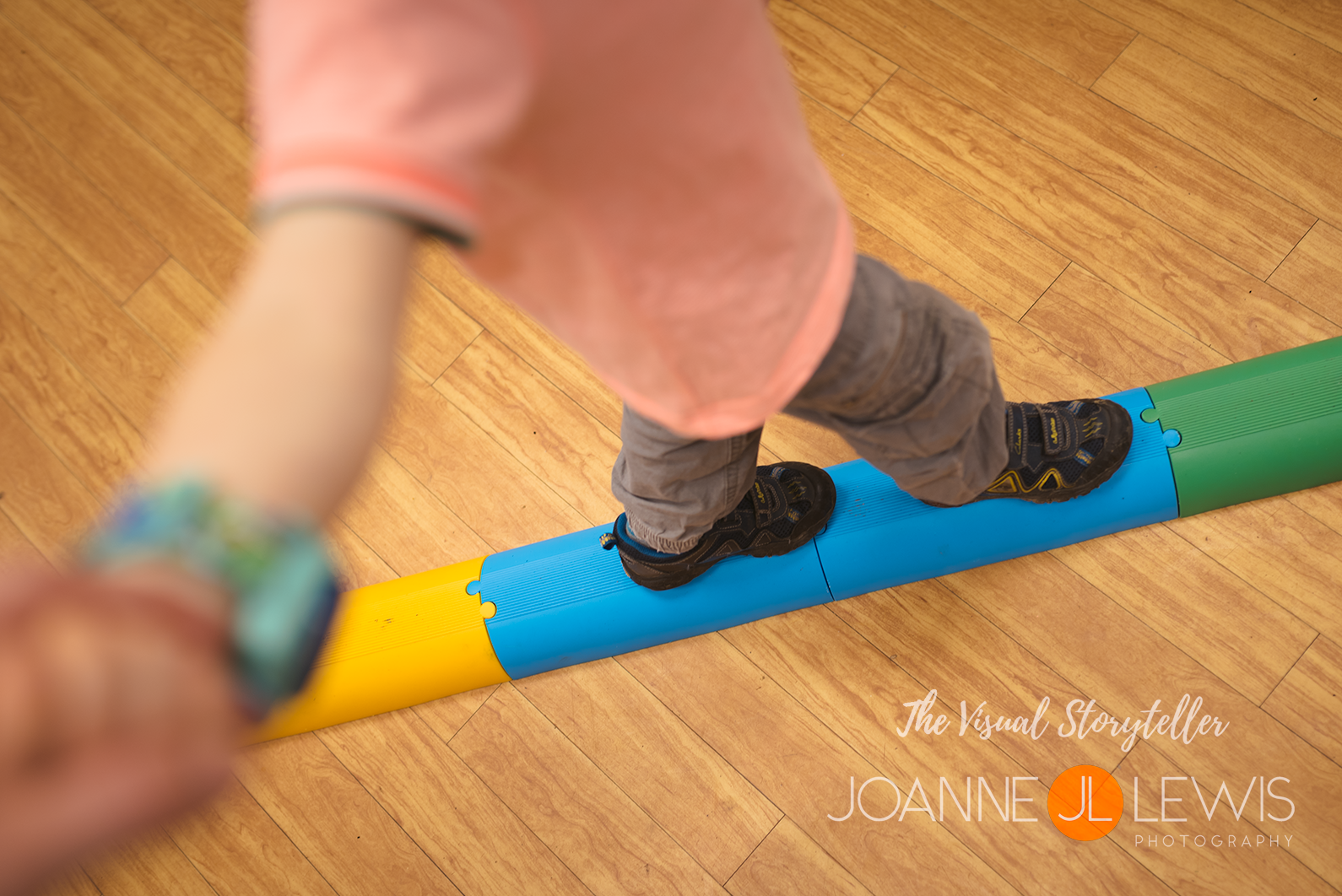 Feet walking across a balance beam