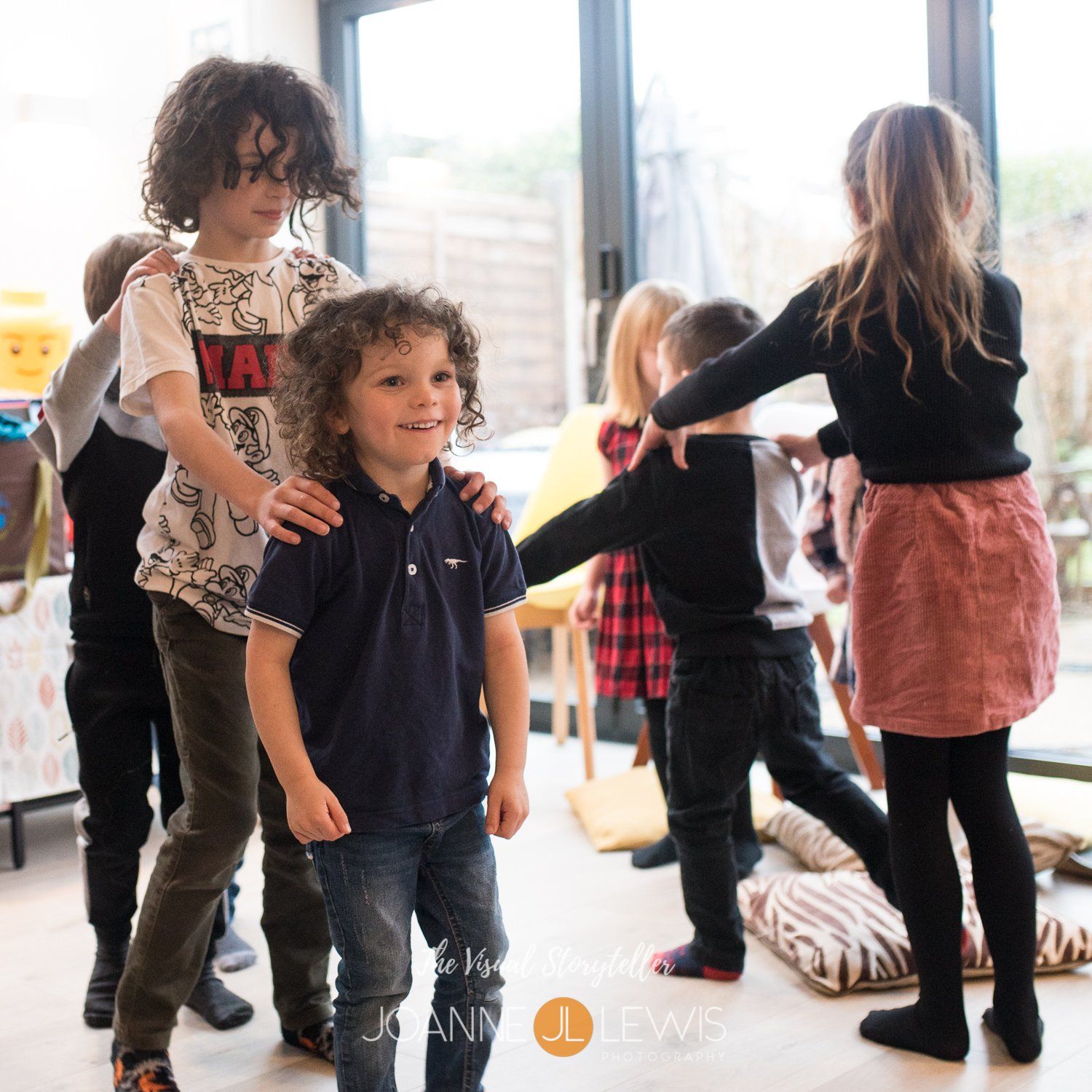 Party conga at young boy's party