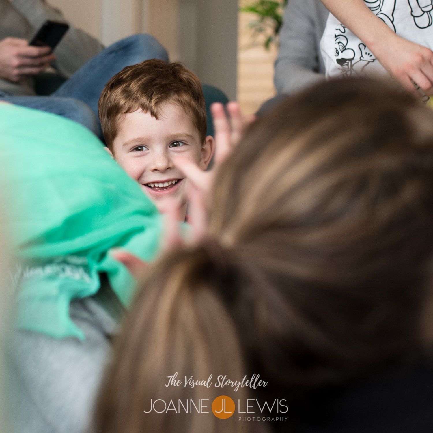 Boy clapping at toddler group games