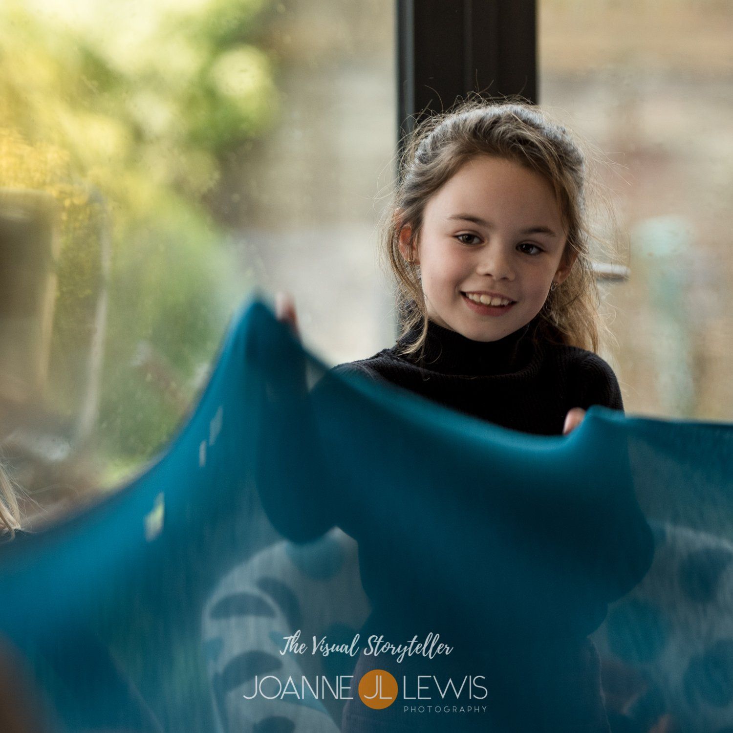 girl playing party games with a sheet
