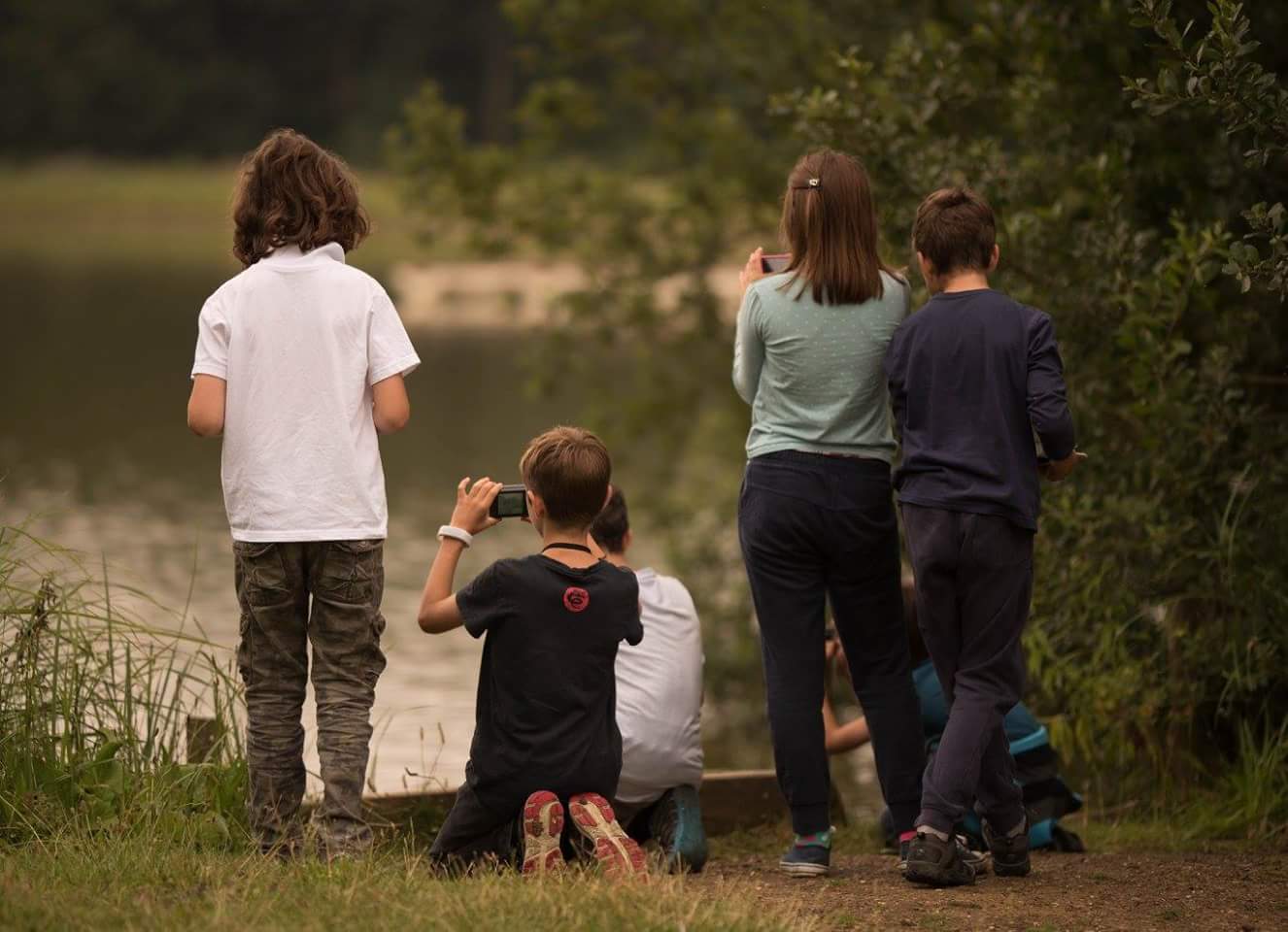 Home education photography class at the river bank
